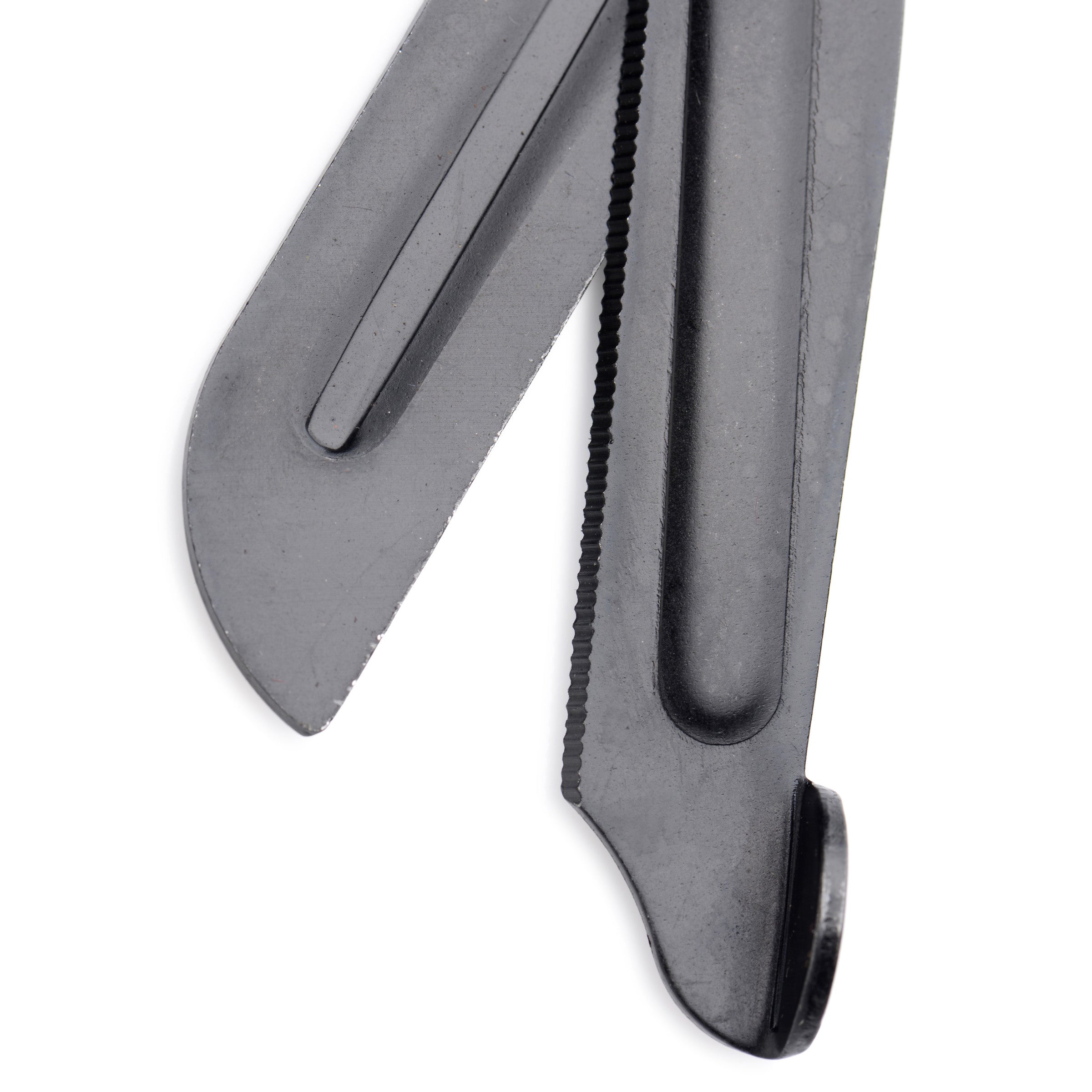 Safety scissors with a black handle designed for bondage emergencies on a white tabletop