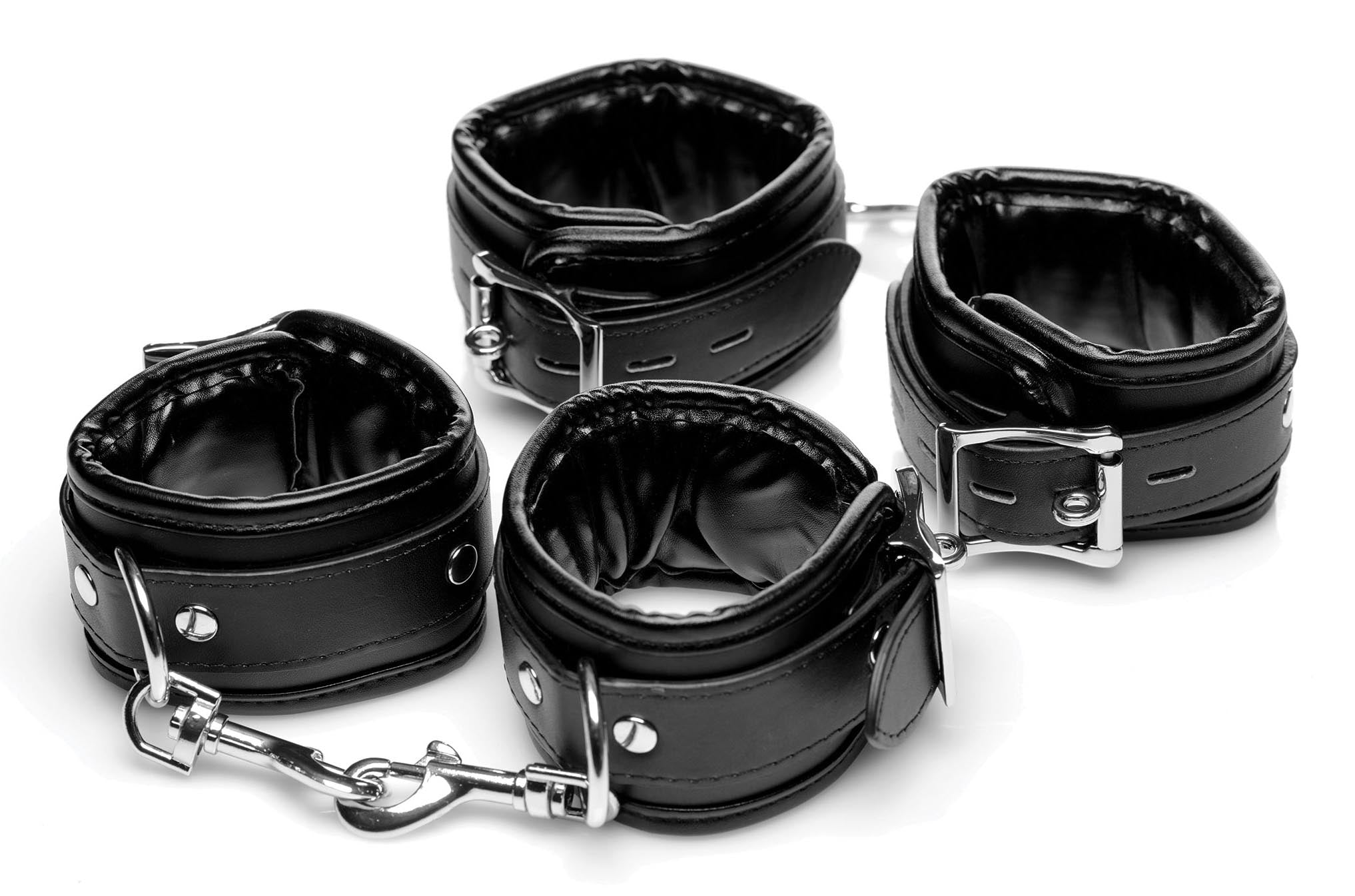 Set of four sturdy leather wrist and ankle cuffs for bondage