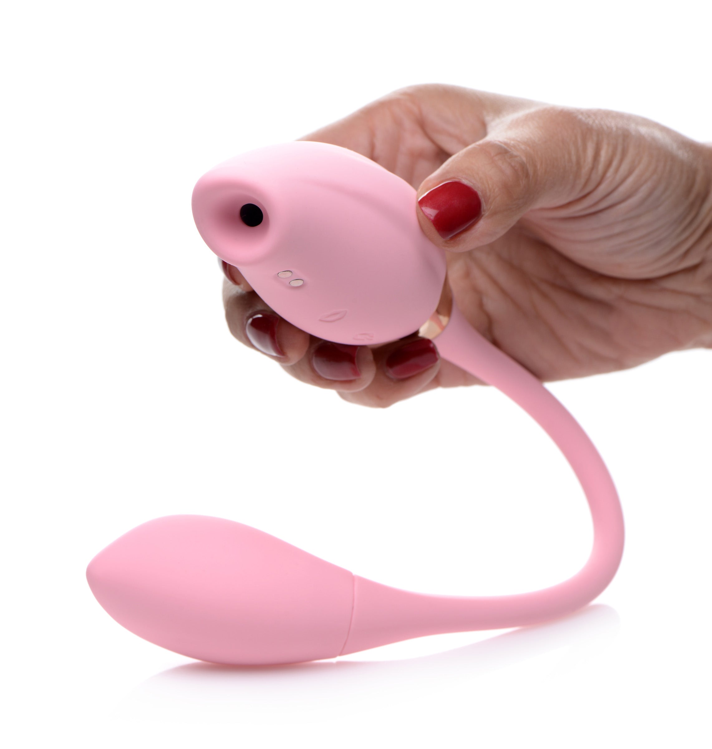 Female hand demonstrating the Shegasm 8x Tandem Plus Silicone Stimulator