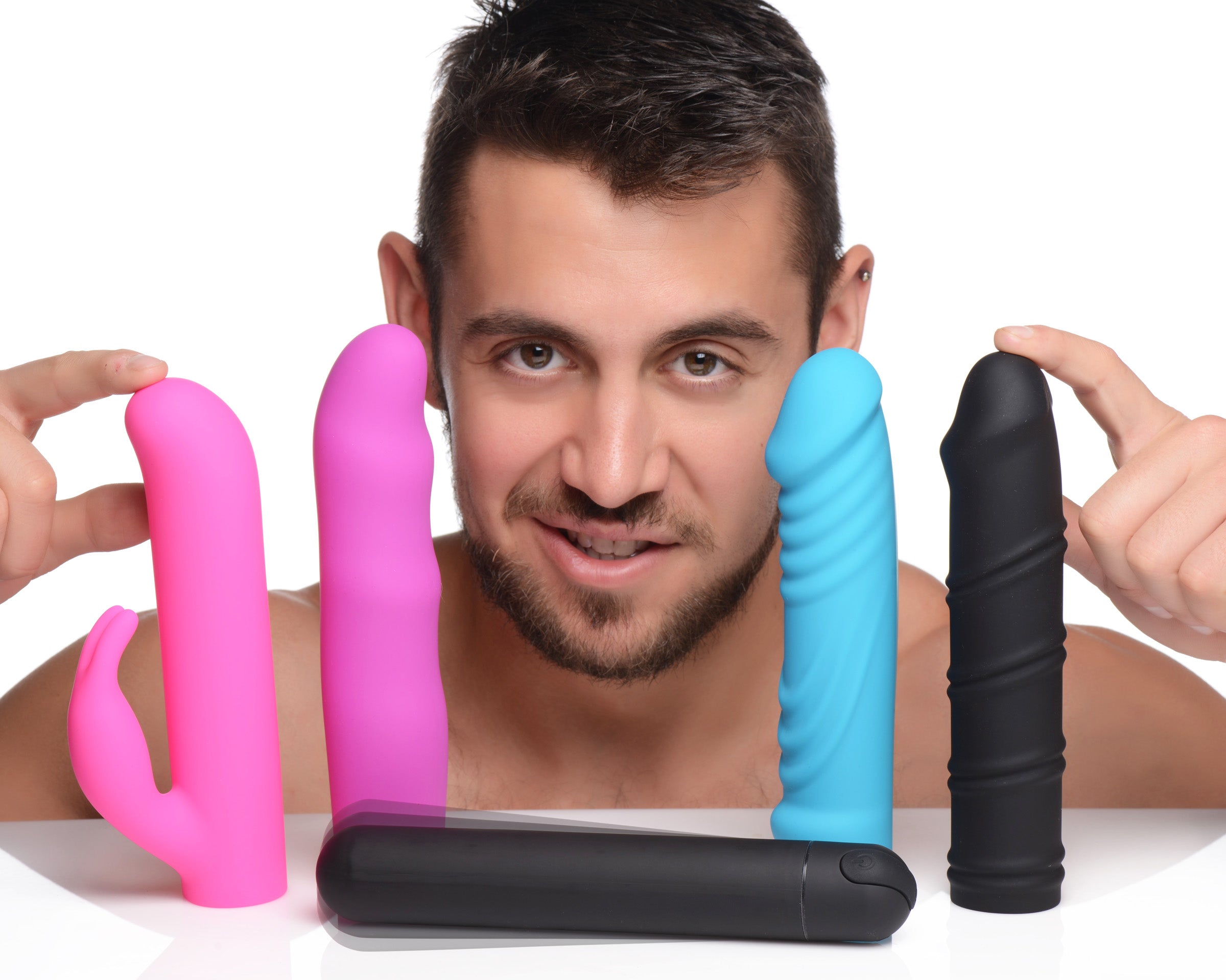 Assorted Silicone Sleeves and Bullet Vibrator Displayed by a Model