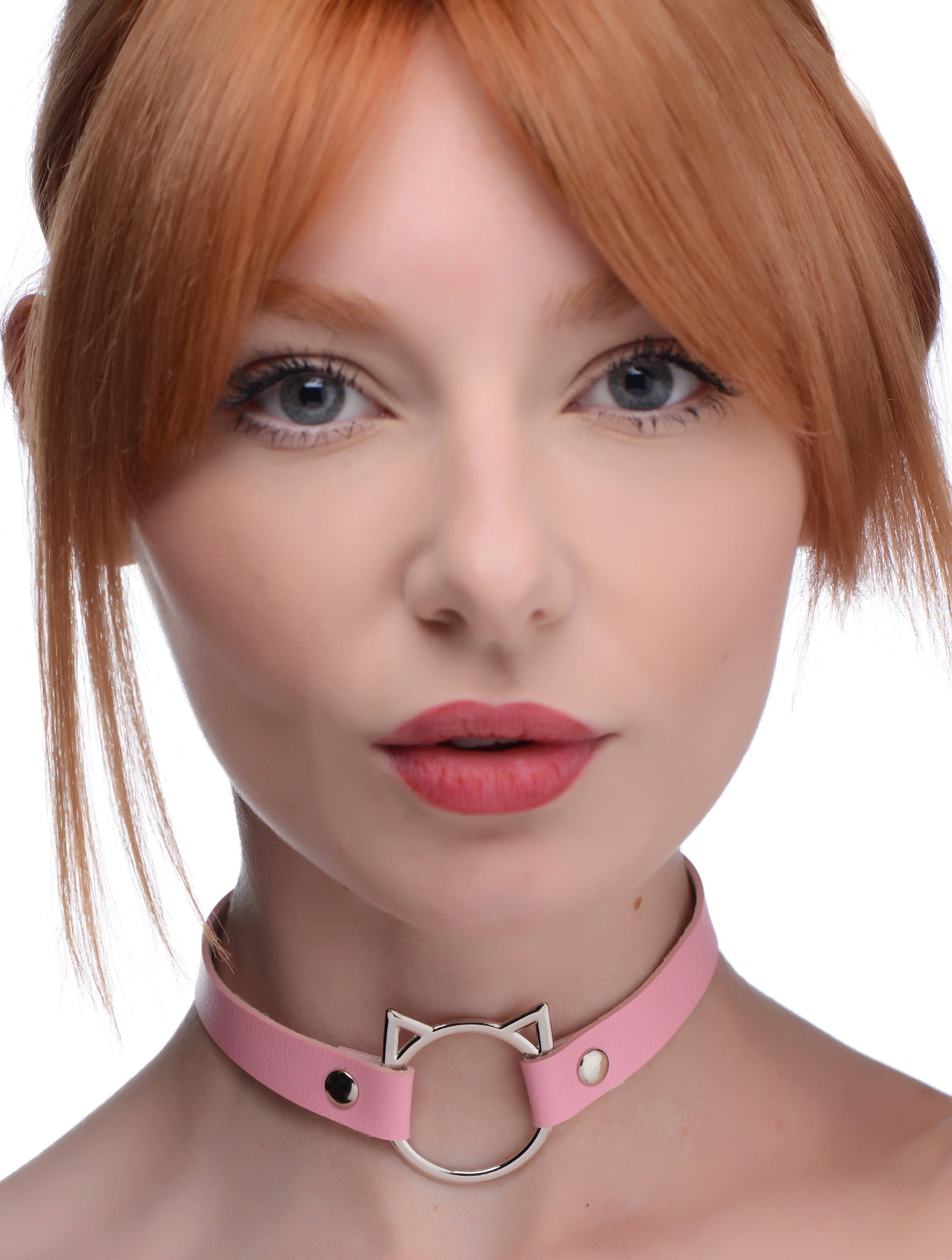 Red-haired woman wearing the Kinky Kitty Ring Slim Choker in pink