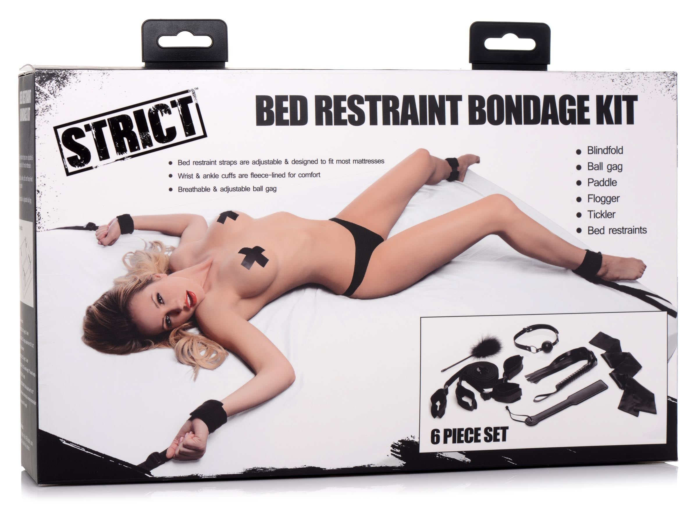 Complete bed restraint bondage kit with various black leather items