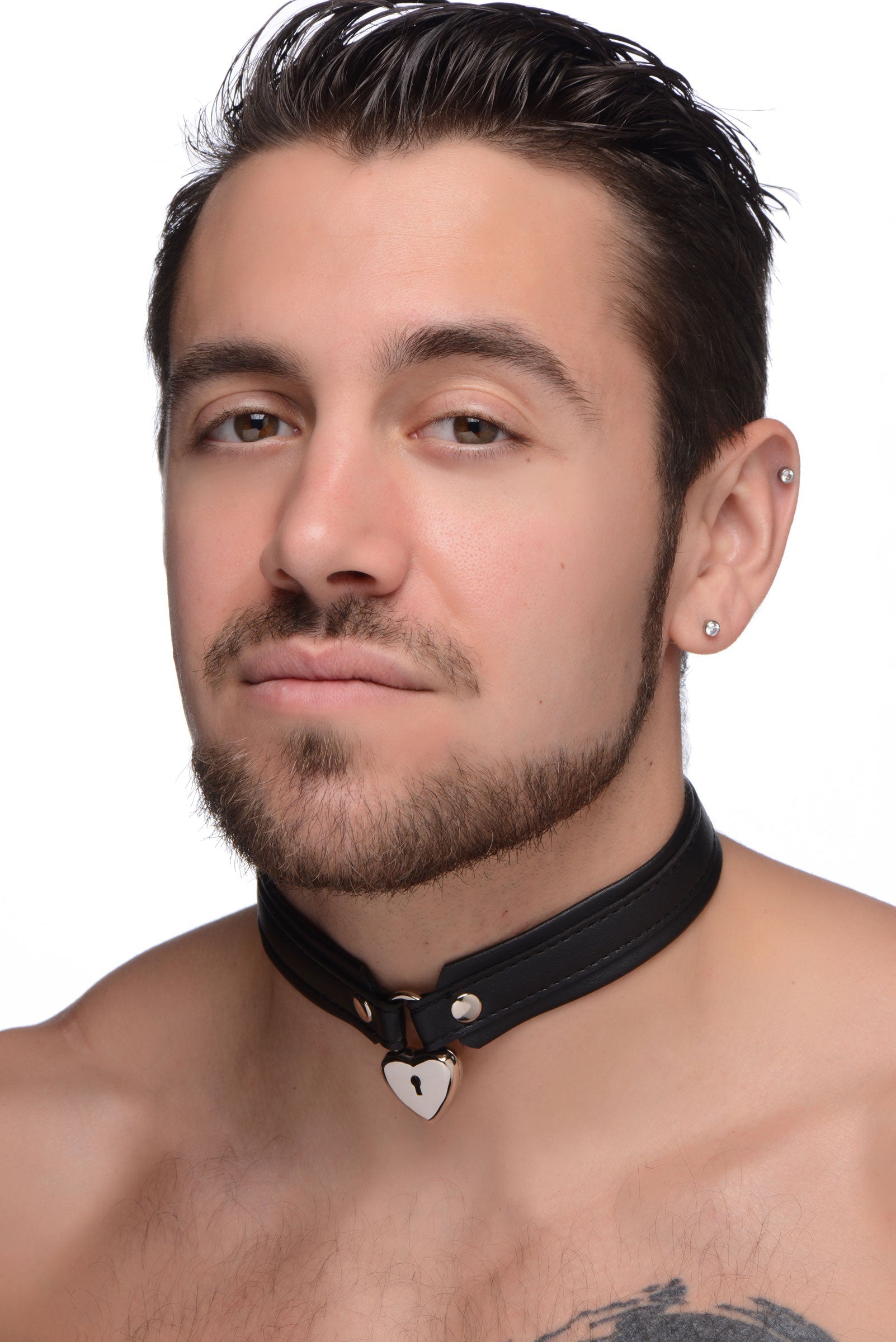 A shirtless male model displaying the Locking Heart Collar around his neck