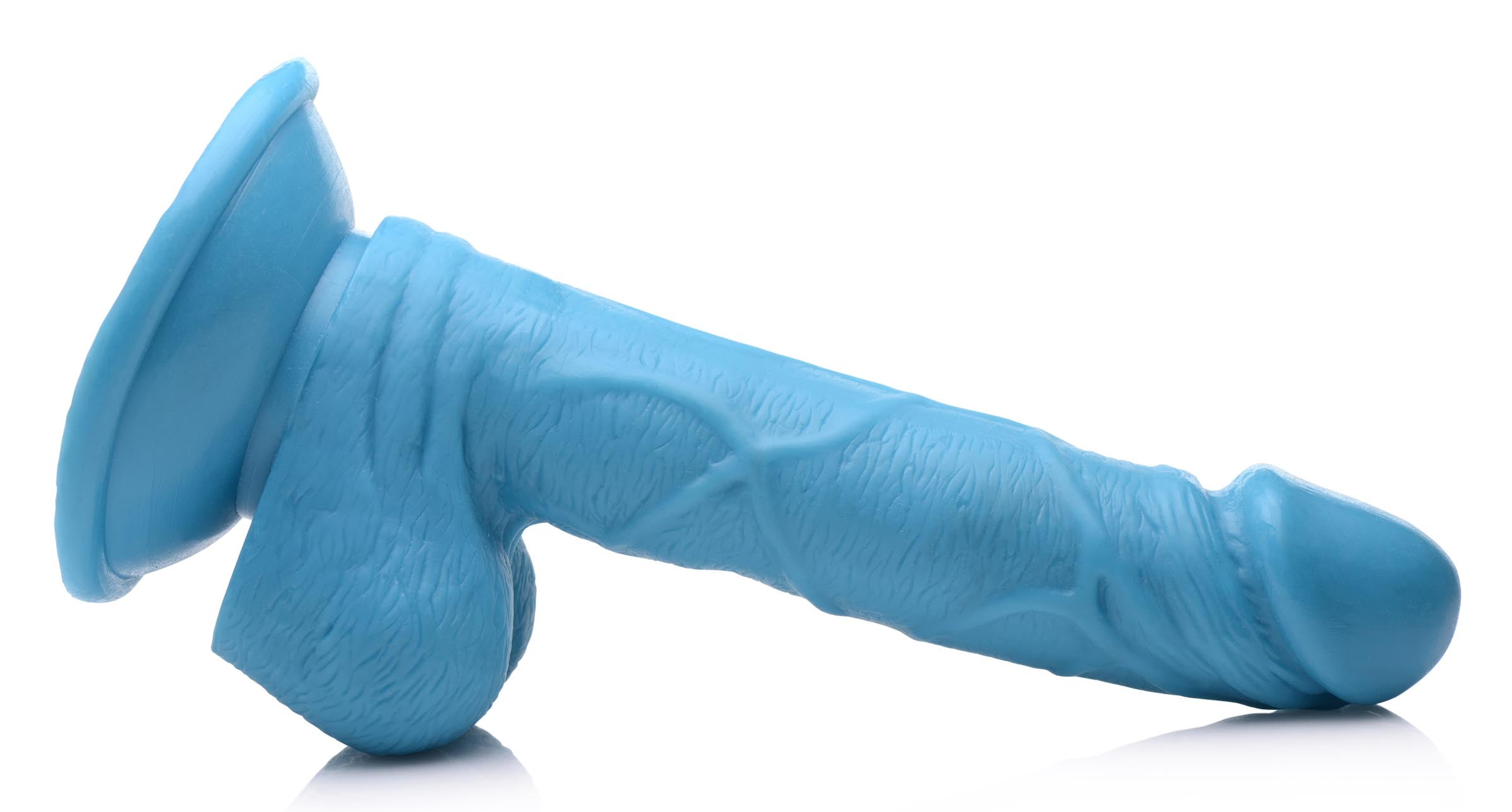 A 6.5 inch dildo with balls in blue color displayed on a white background