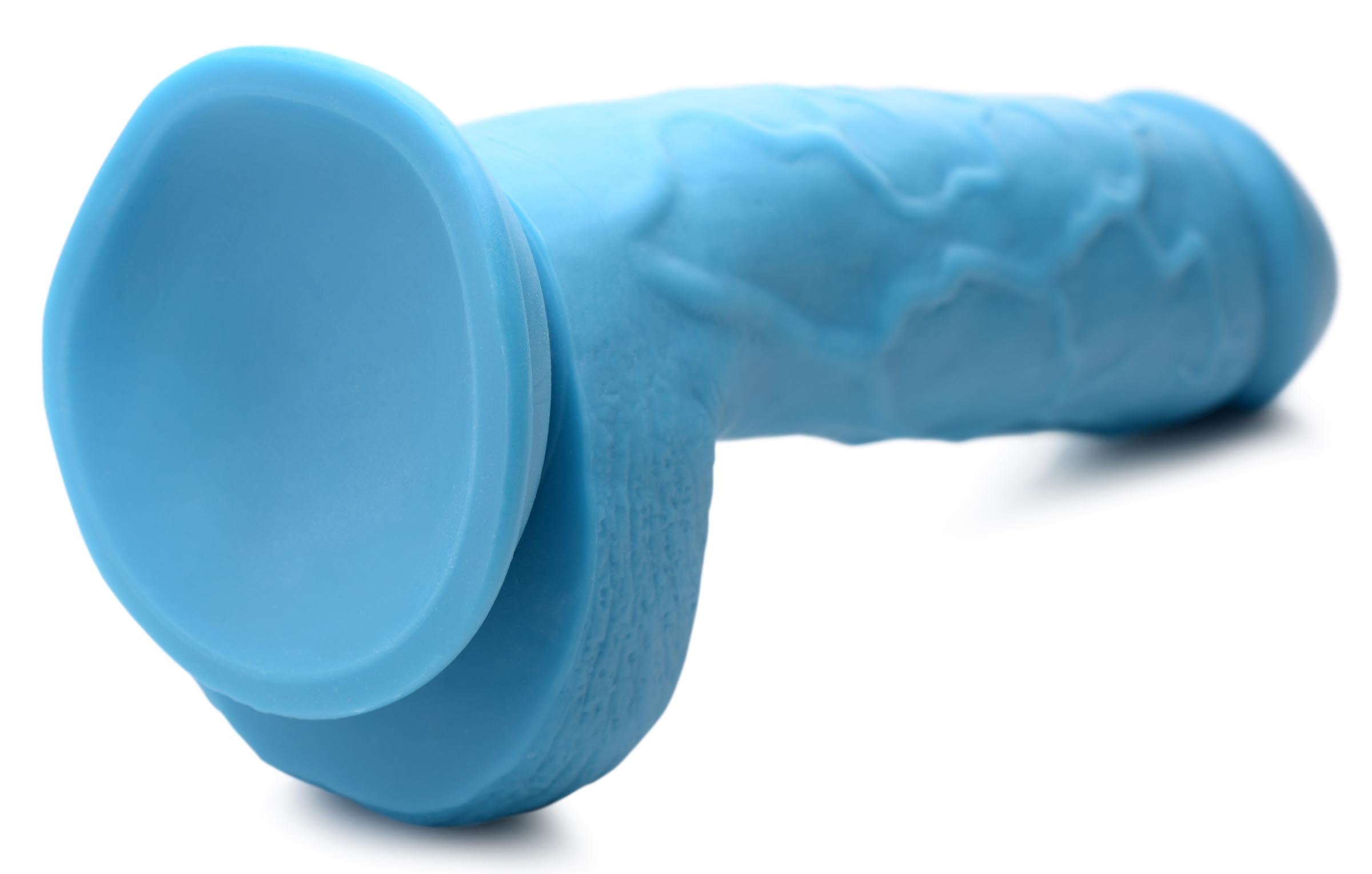 Close-up of the textured surface of the 8.25 inch blue dildo with balls