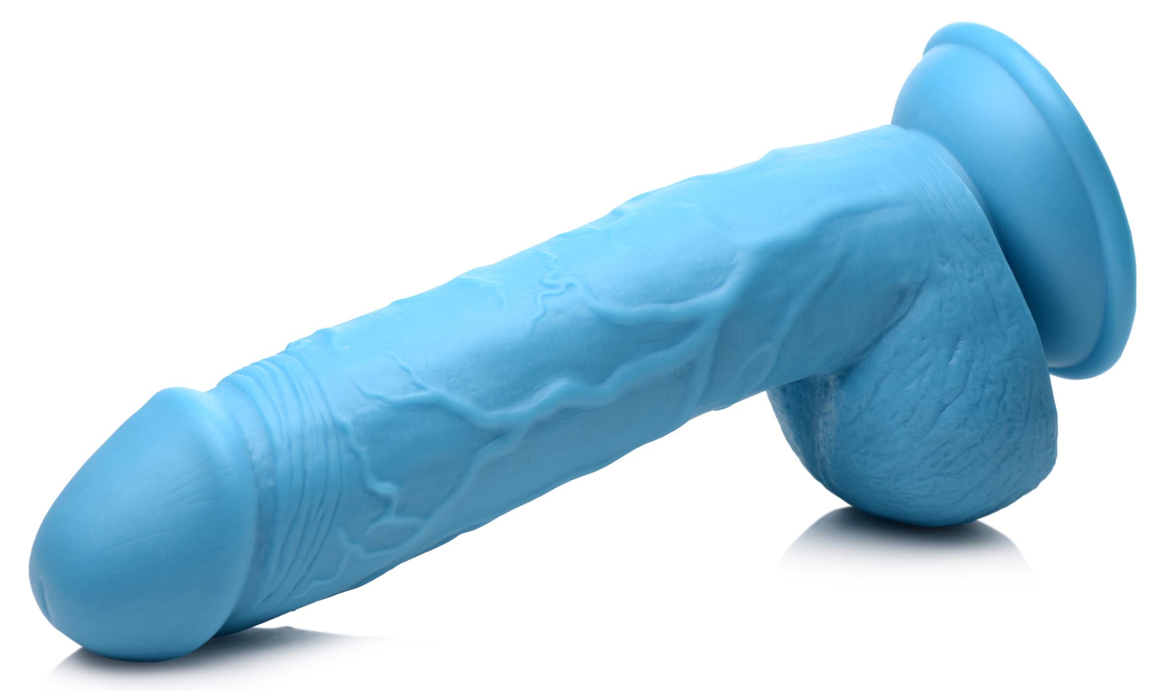 Side view of the 8.25 inch blue dildo with balls showcasing its texture