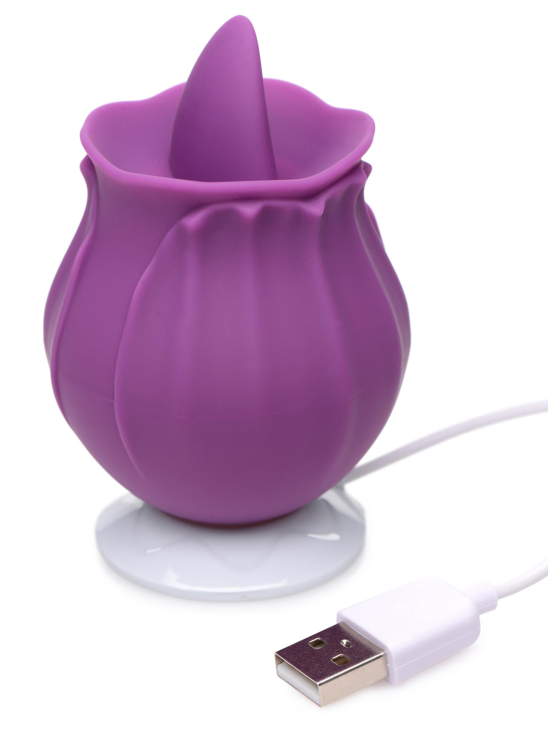 USB charger for silicone clit stimulator with a purple floral design and white cord