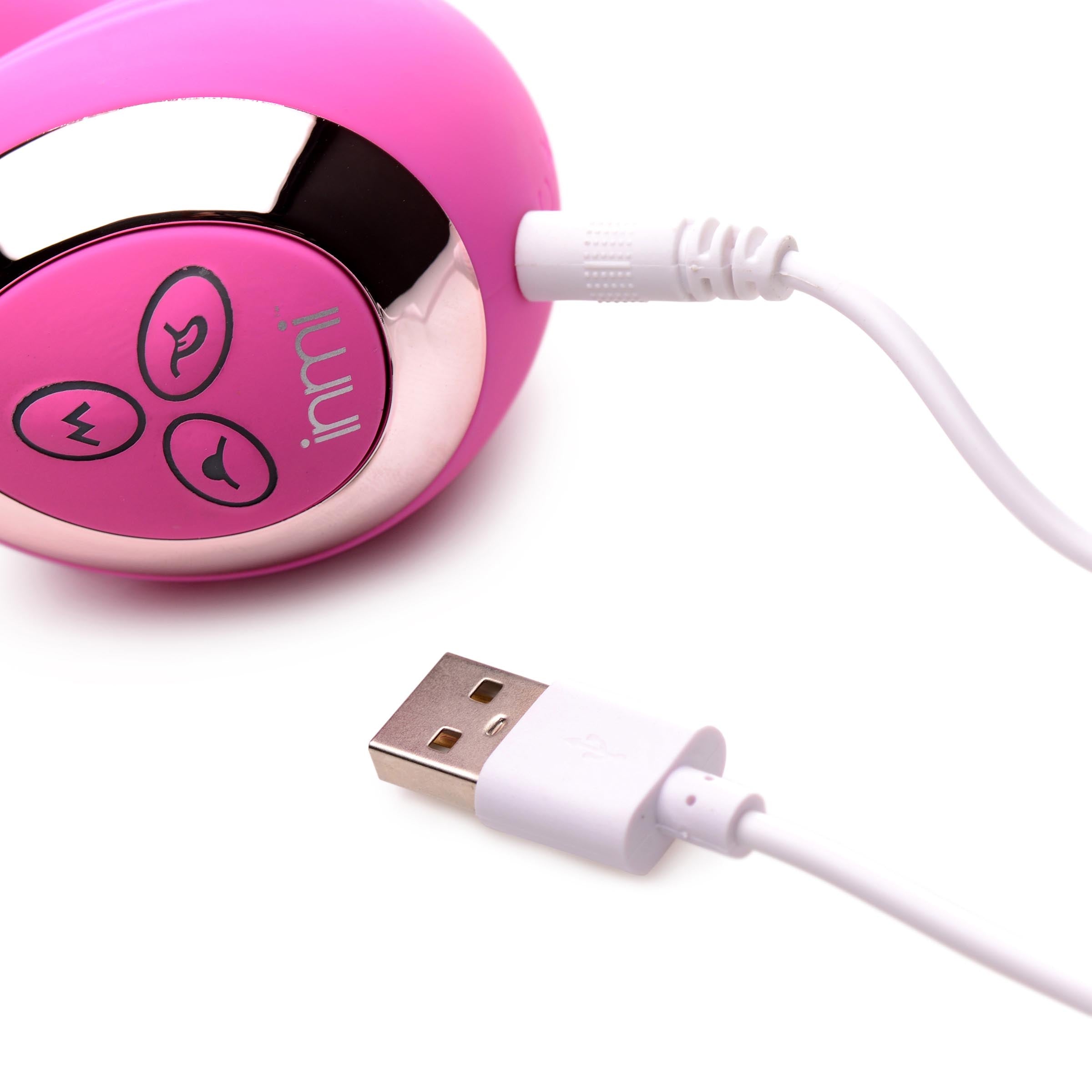 Incorrect image of a pink and white portable speaker, not related to the product