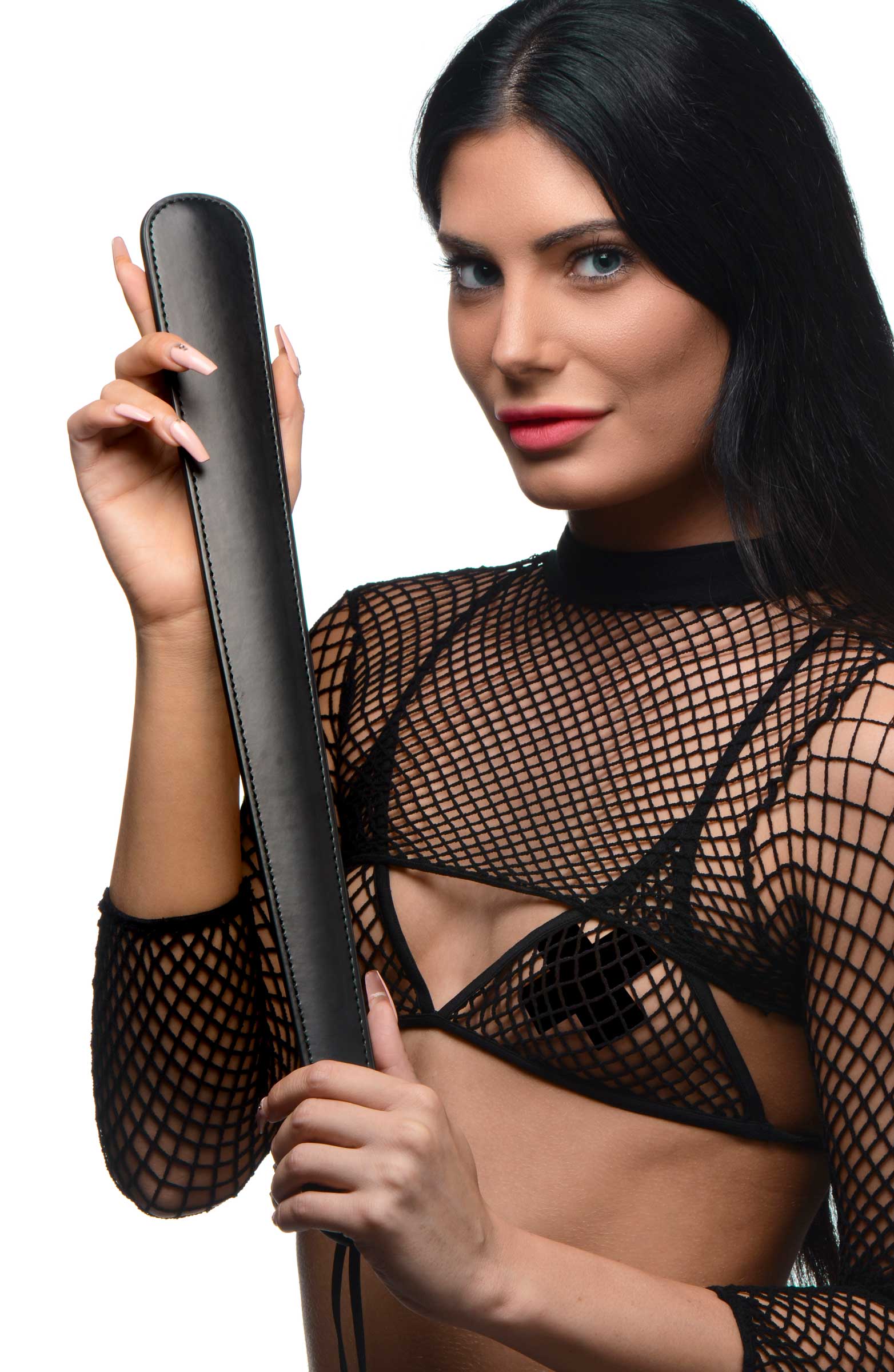 A person in a fishnet top brandishing a 19-inch leather slapper paddle