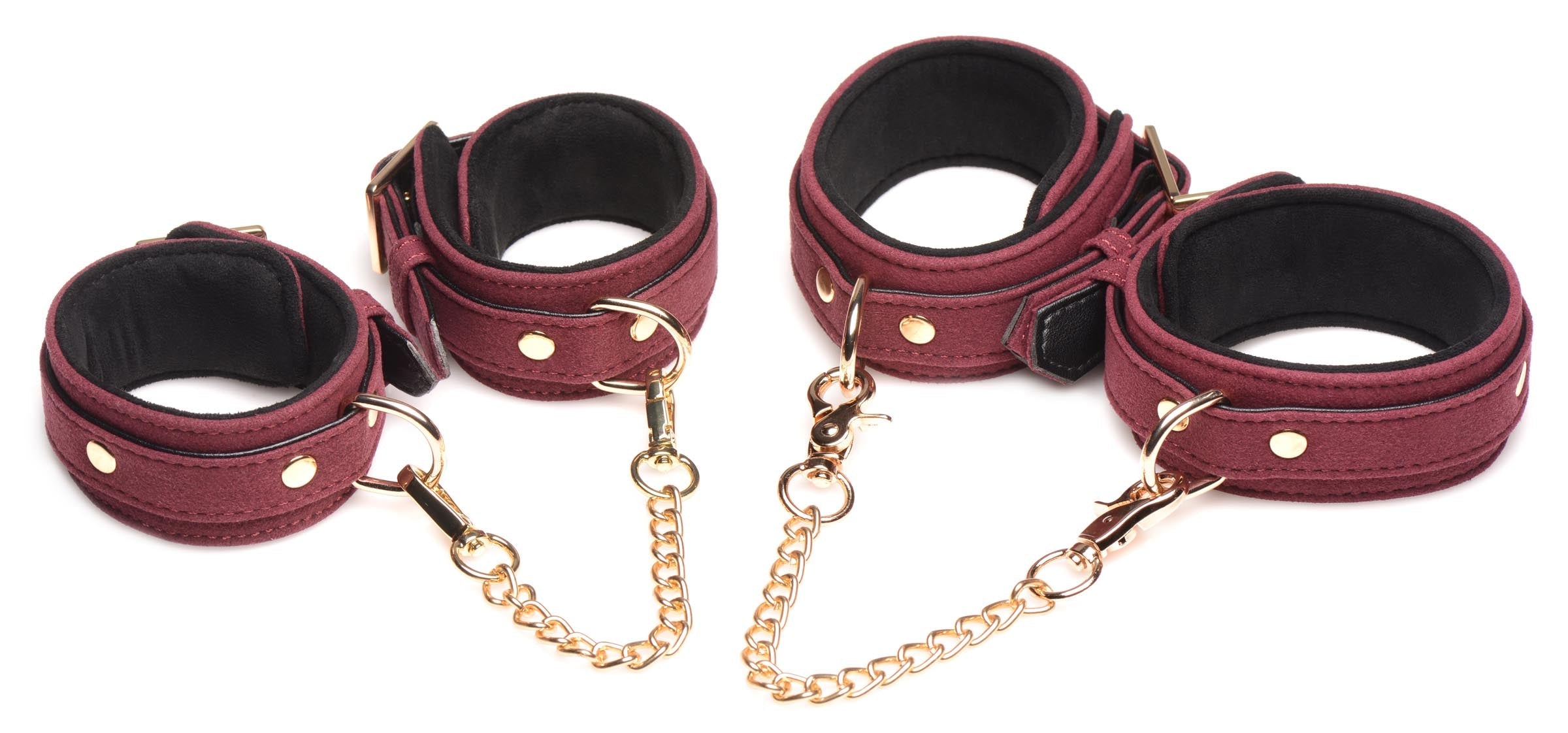 Pair of burgundy velvet wrist cuffs with attached gold-tone chains