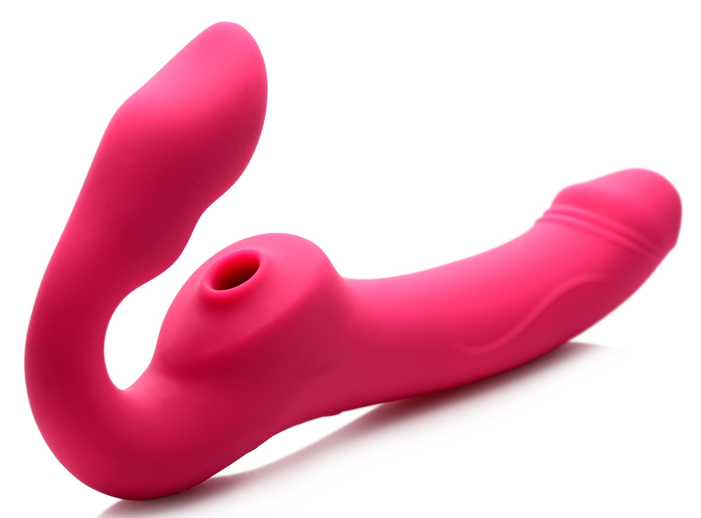 Side view of the pink strapless strap-on with remote