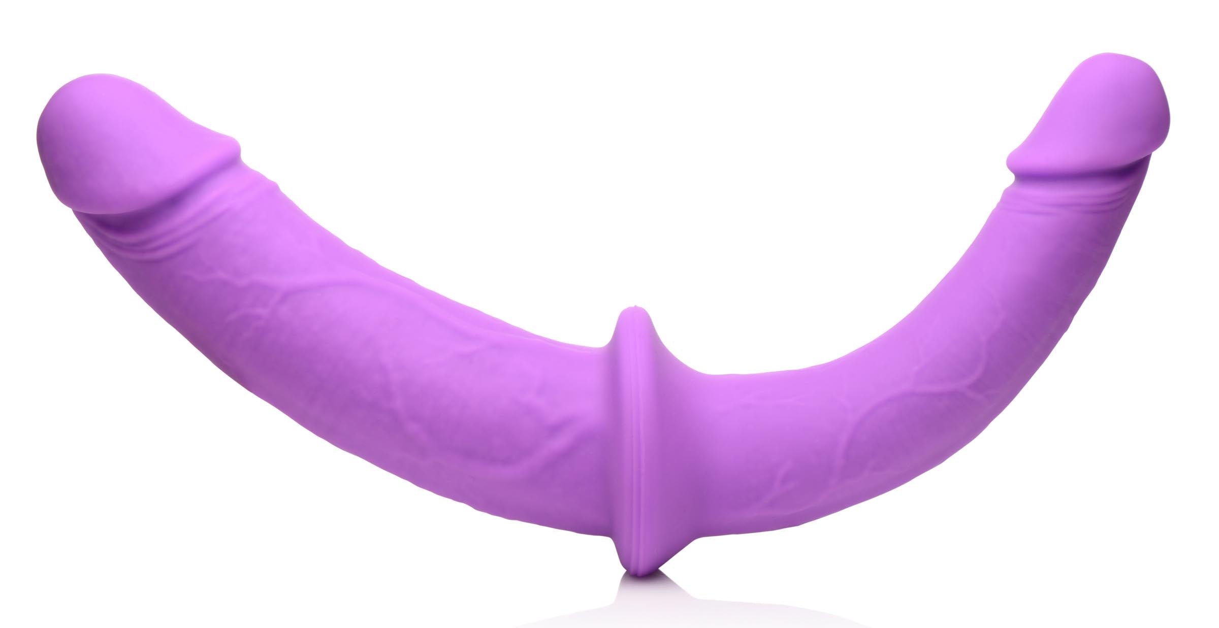 Silicone double-ended dildo in purple with harness