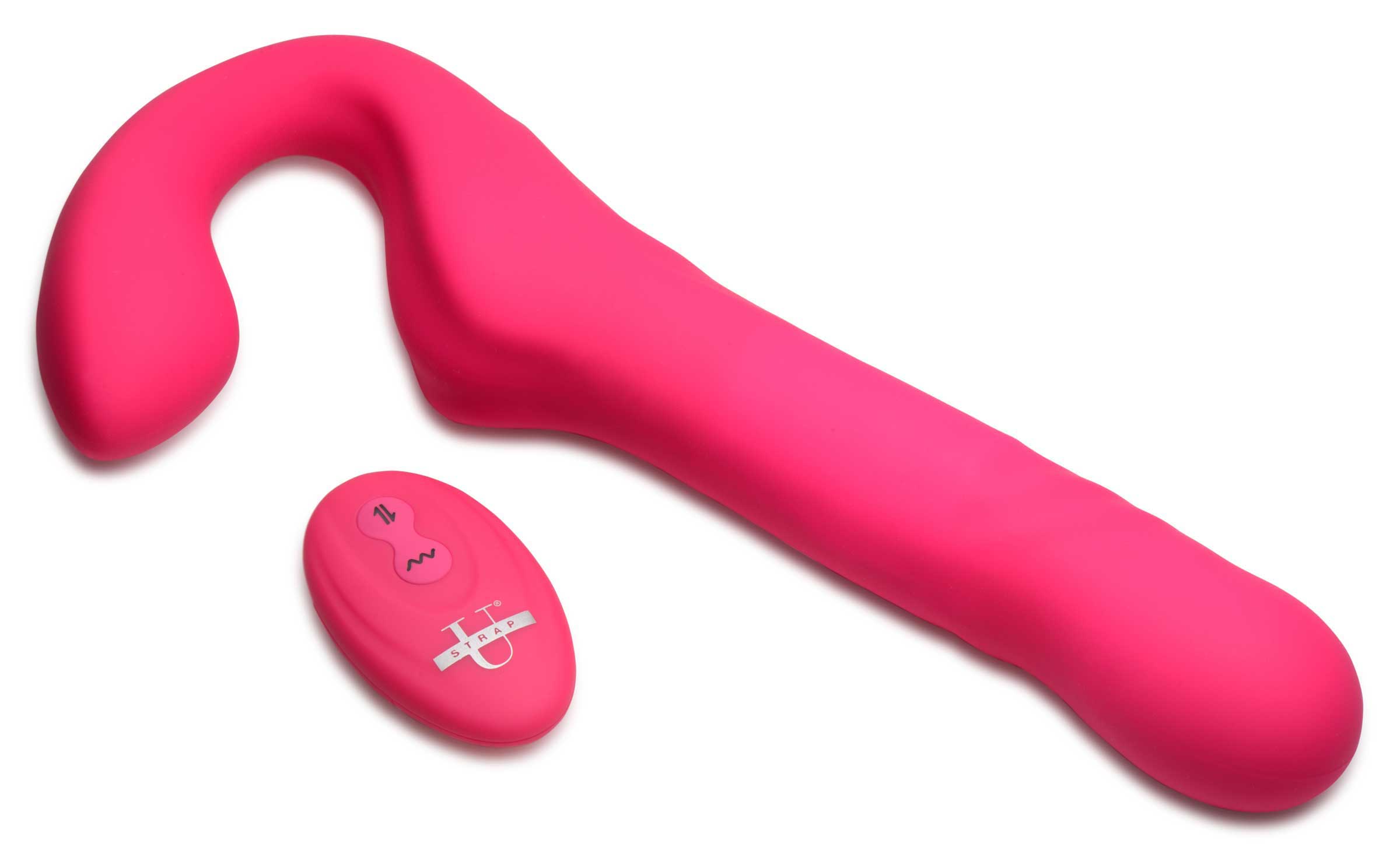 Close-up of the pink strapless strap-on with its remote control