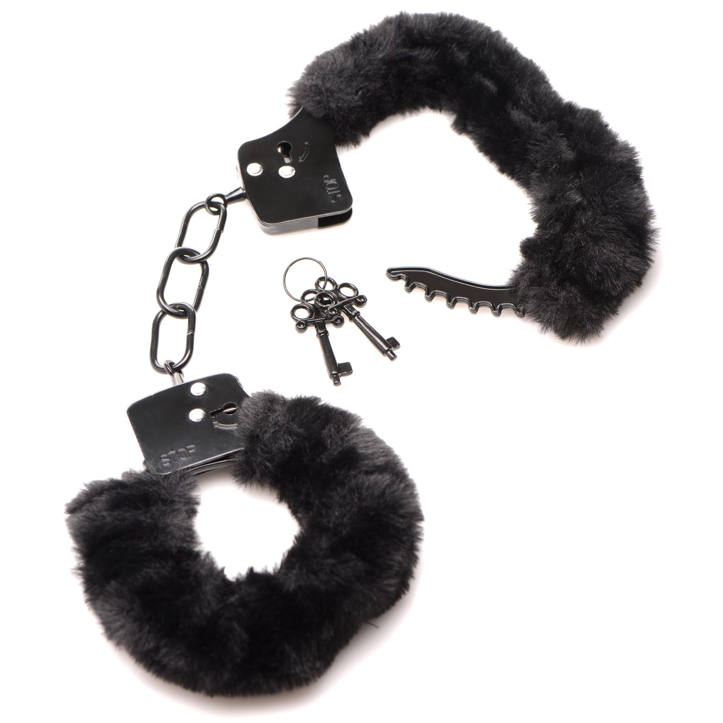 Furry handcuffs with attached keys on a keyring