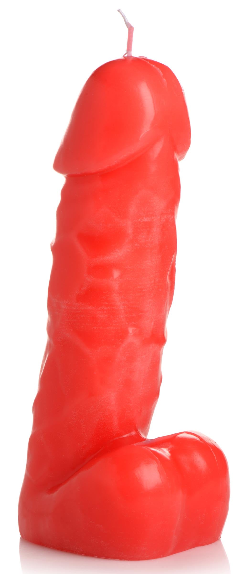 A novelty red candle in the shape of male genitalia