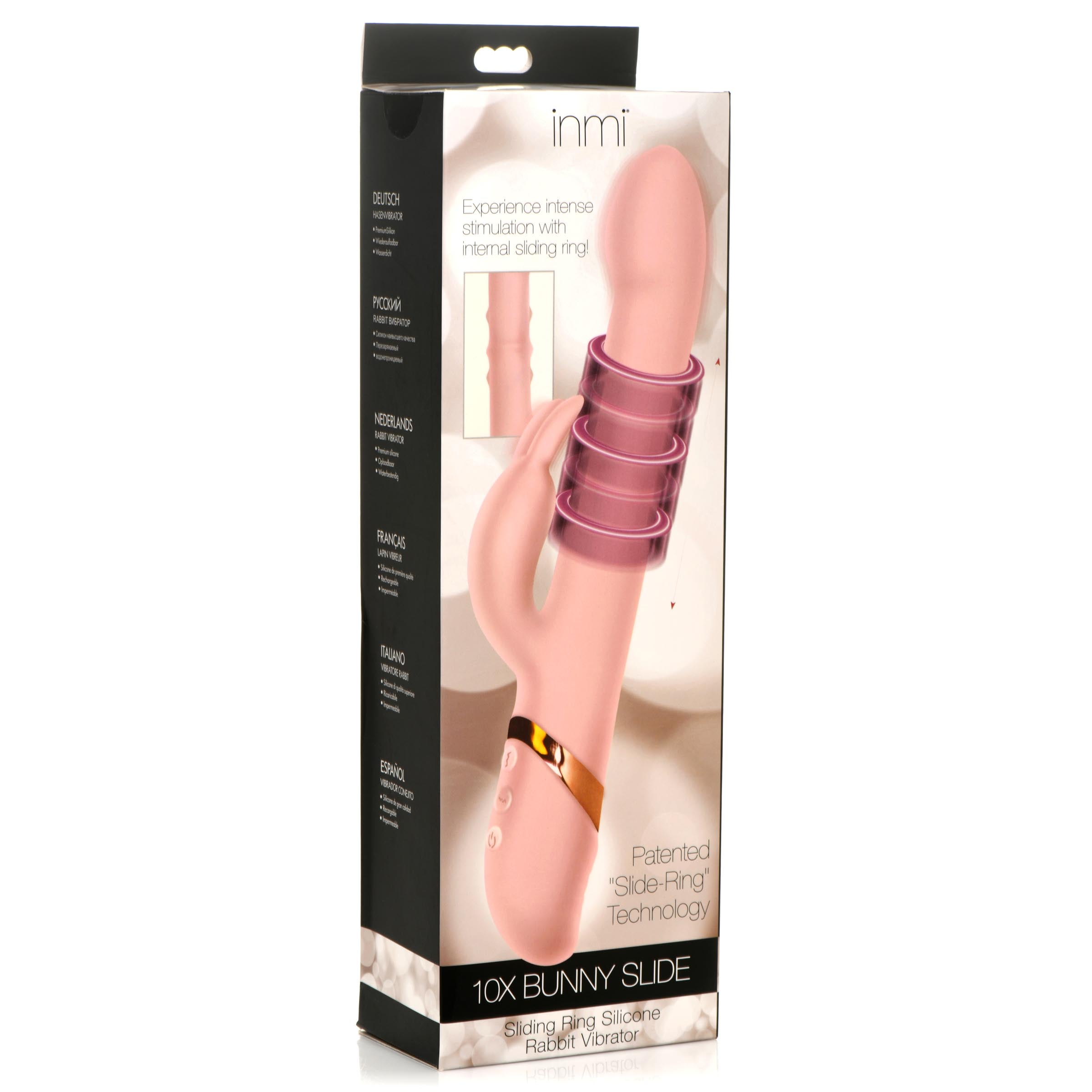 Pink silicone ring vibrator with bunny design in original packaging