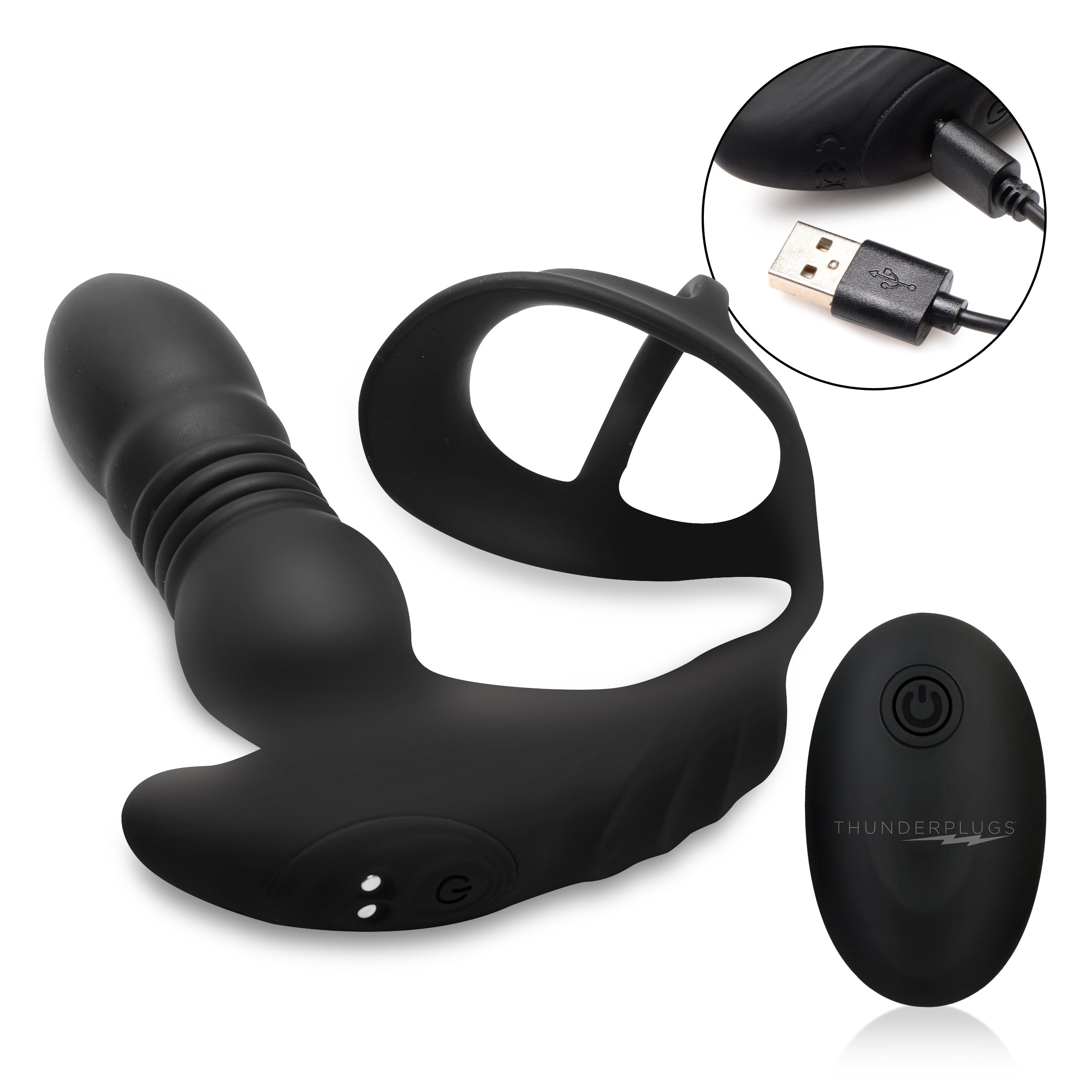 Remote control connected to the black vibrating cock and ball ring.""