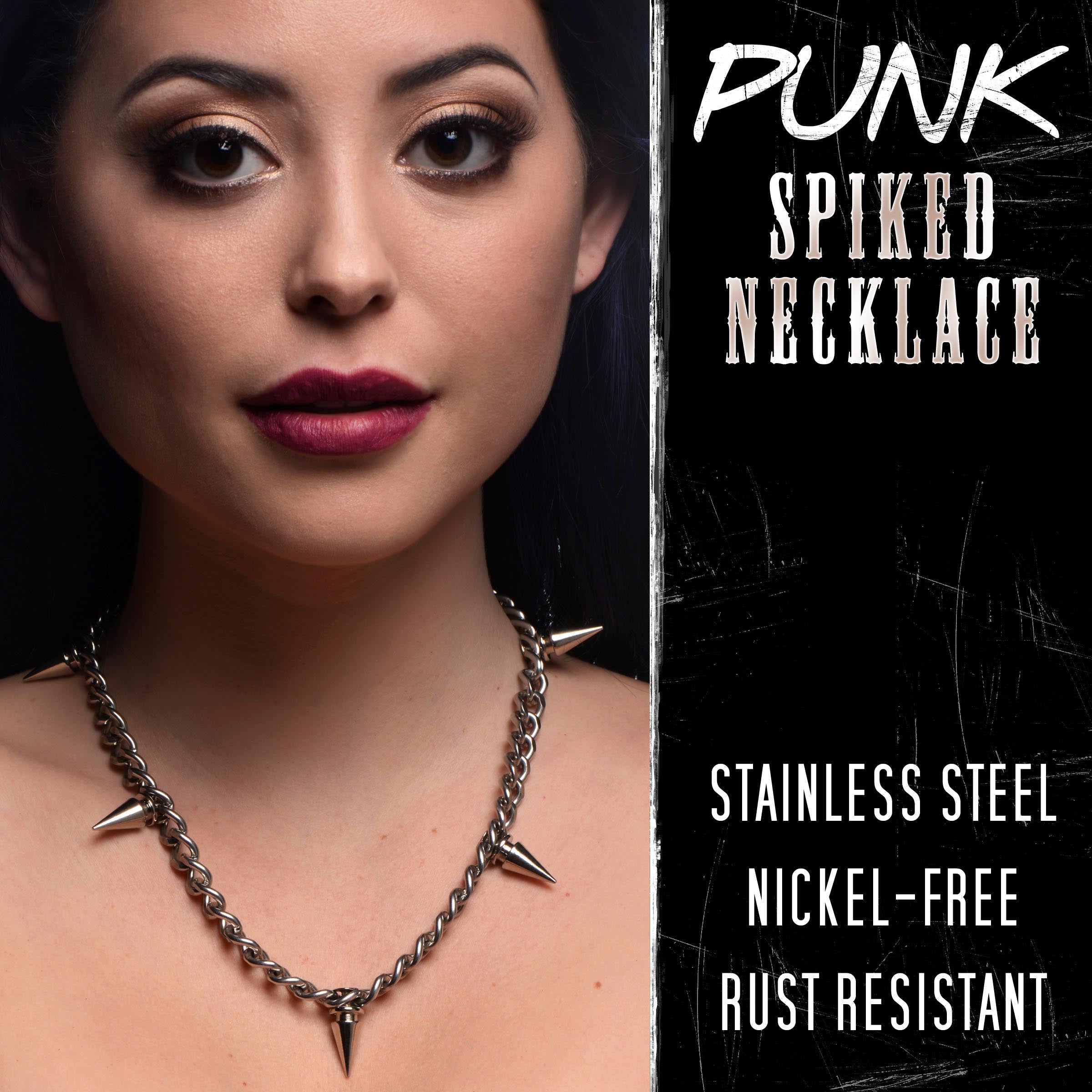 Female model dressed in black showcasing the Spiked Punk Necklace