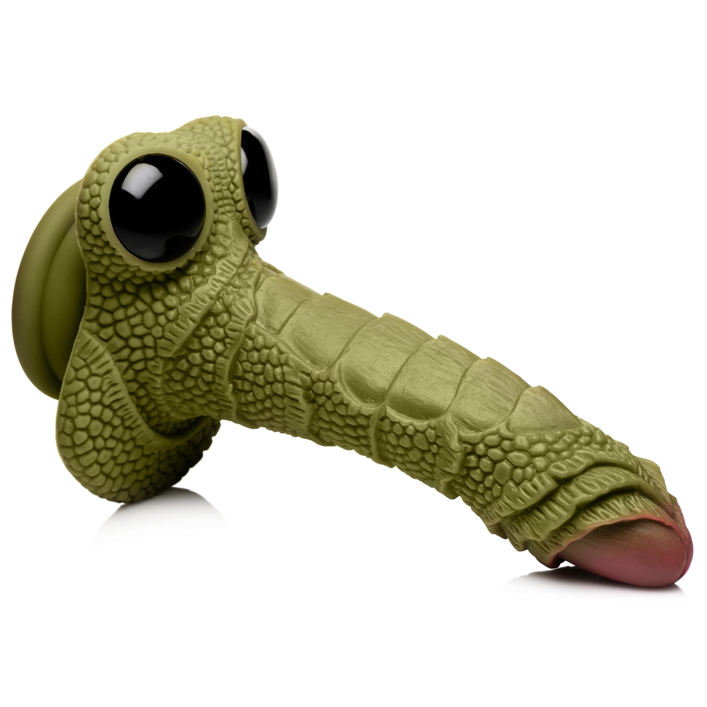 Silicone dildo with scaly texture and monster-themed aesthetics