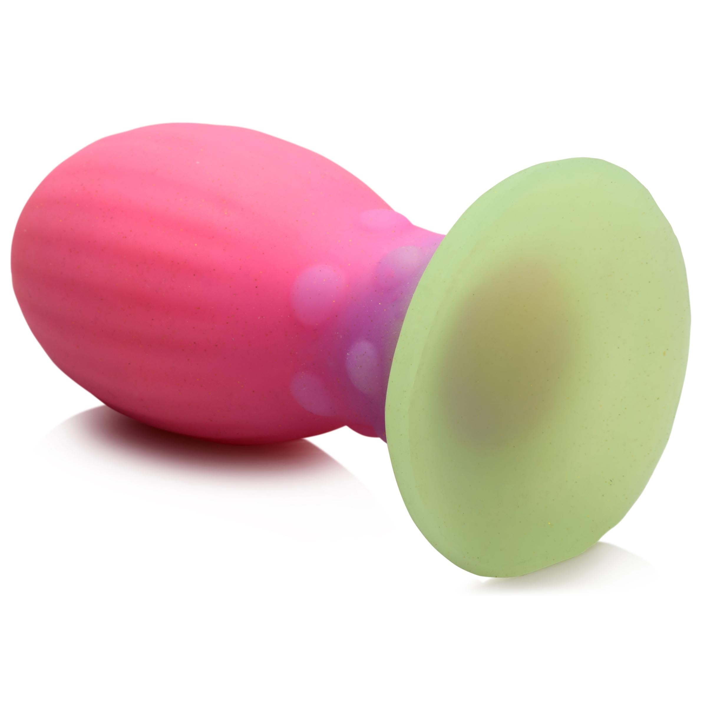 Glow-in-the-dark Xeno Egg silicone toy with a pink and green design