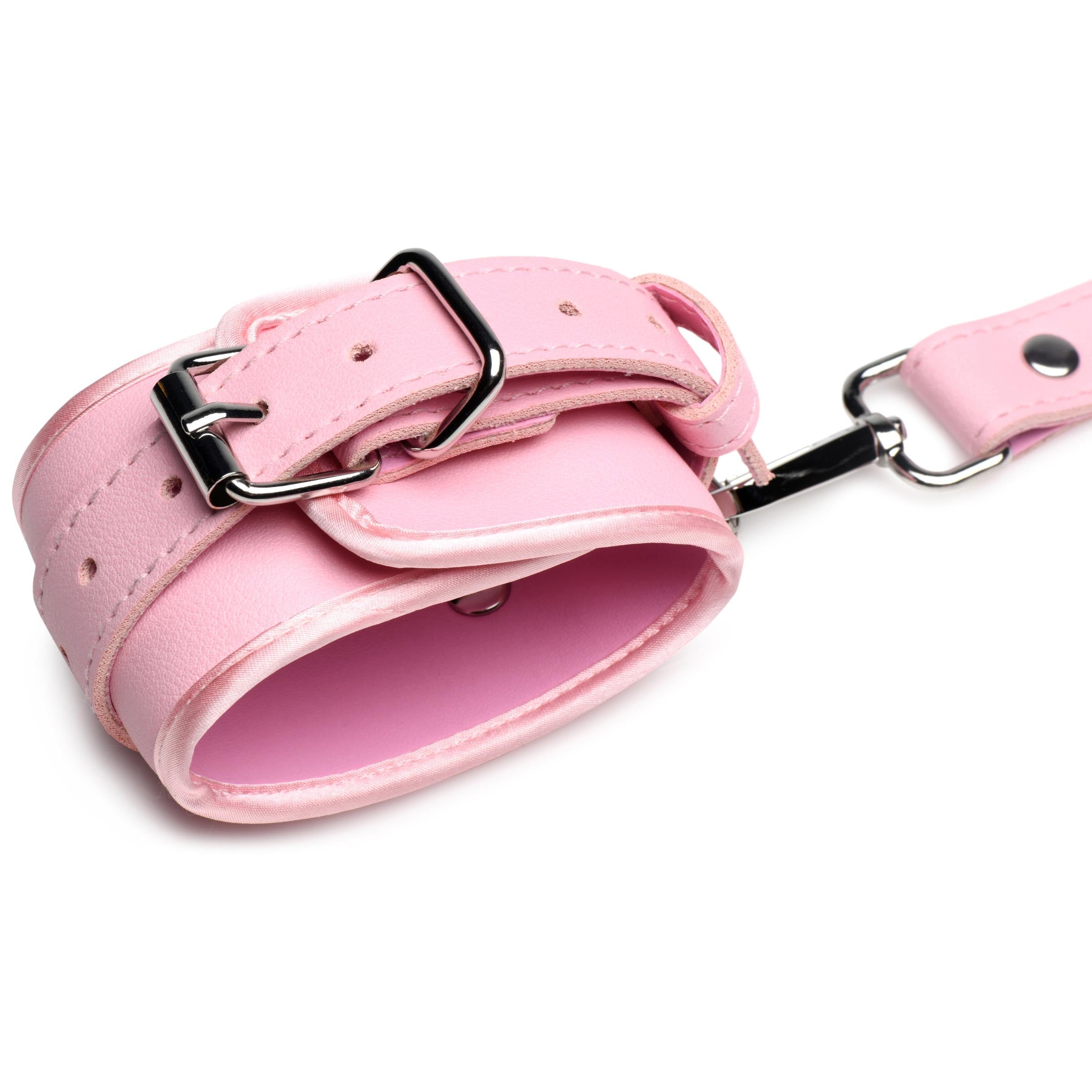 Metal buckle feature on the Pink Bondage Thigh Harness