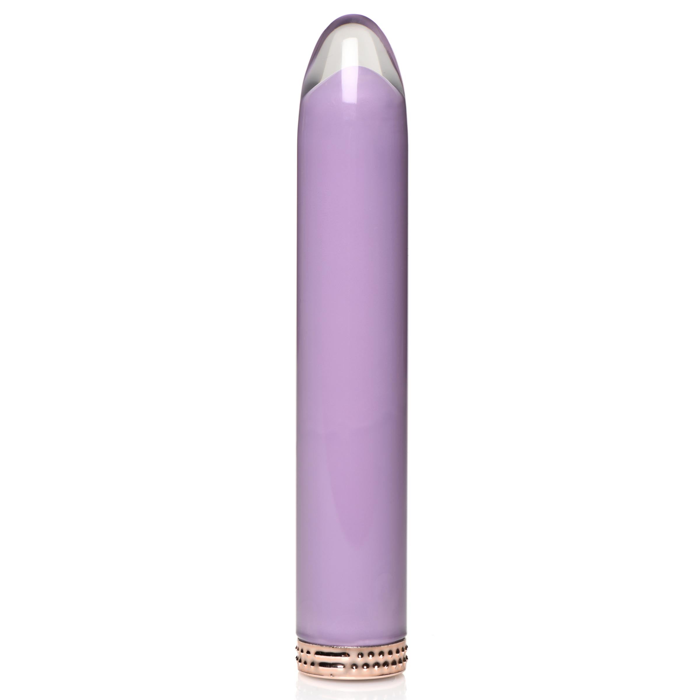 Compact lilac mini vibrator against a pristine white backdrop