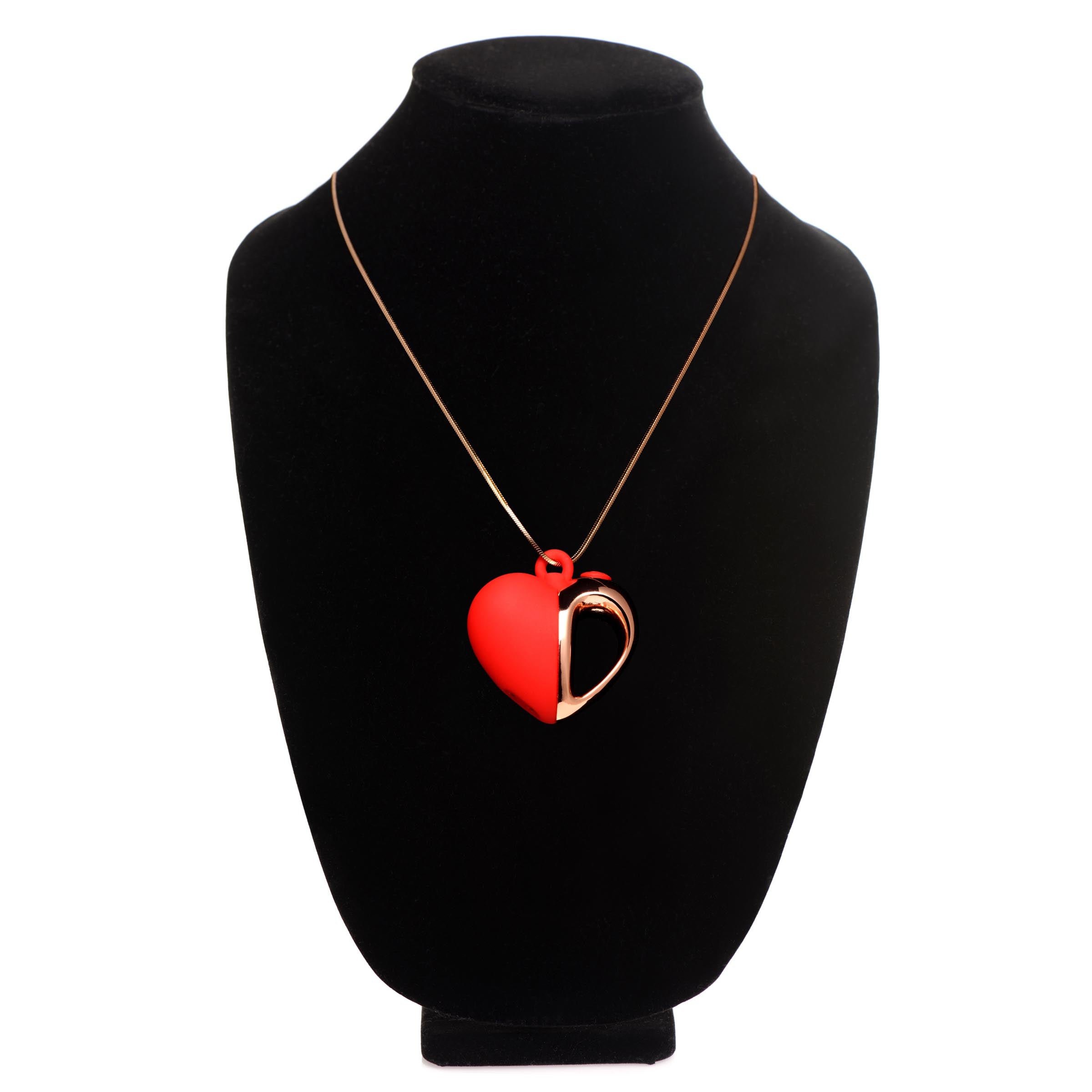 Silicone heart-shaped vibrating necklace displayed on a dark mannequin