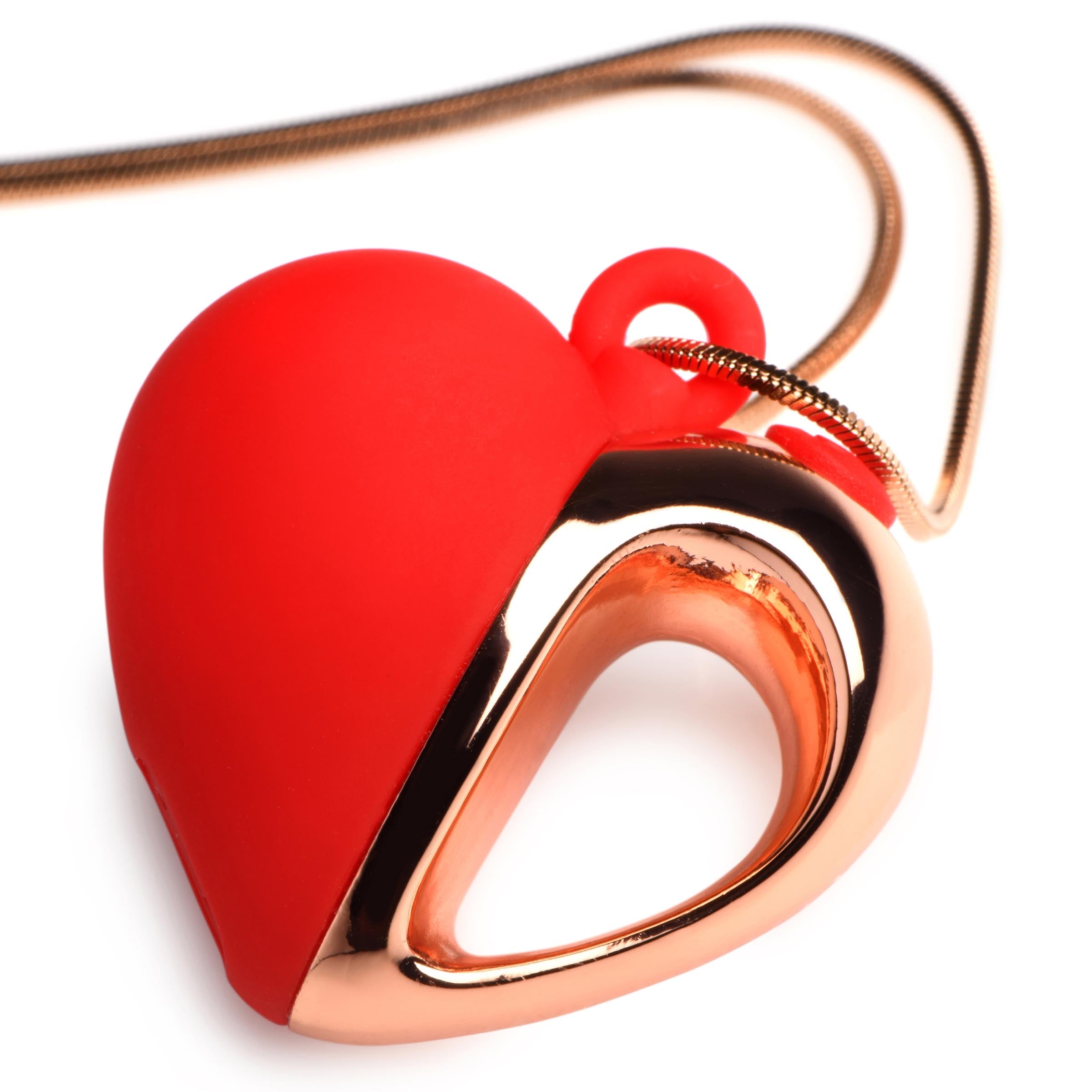 Detailed view of the red silicone heart pendant with its accompanying chain