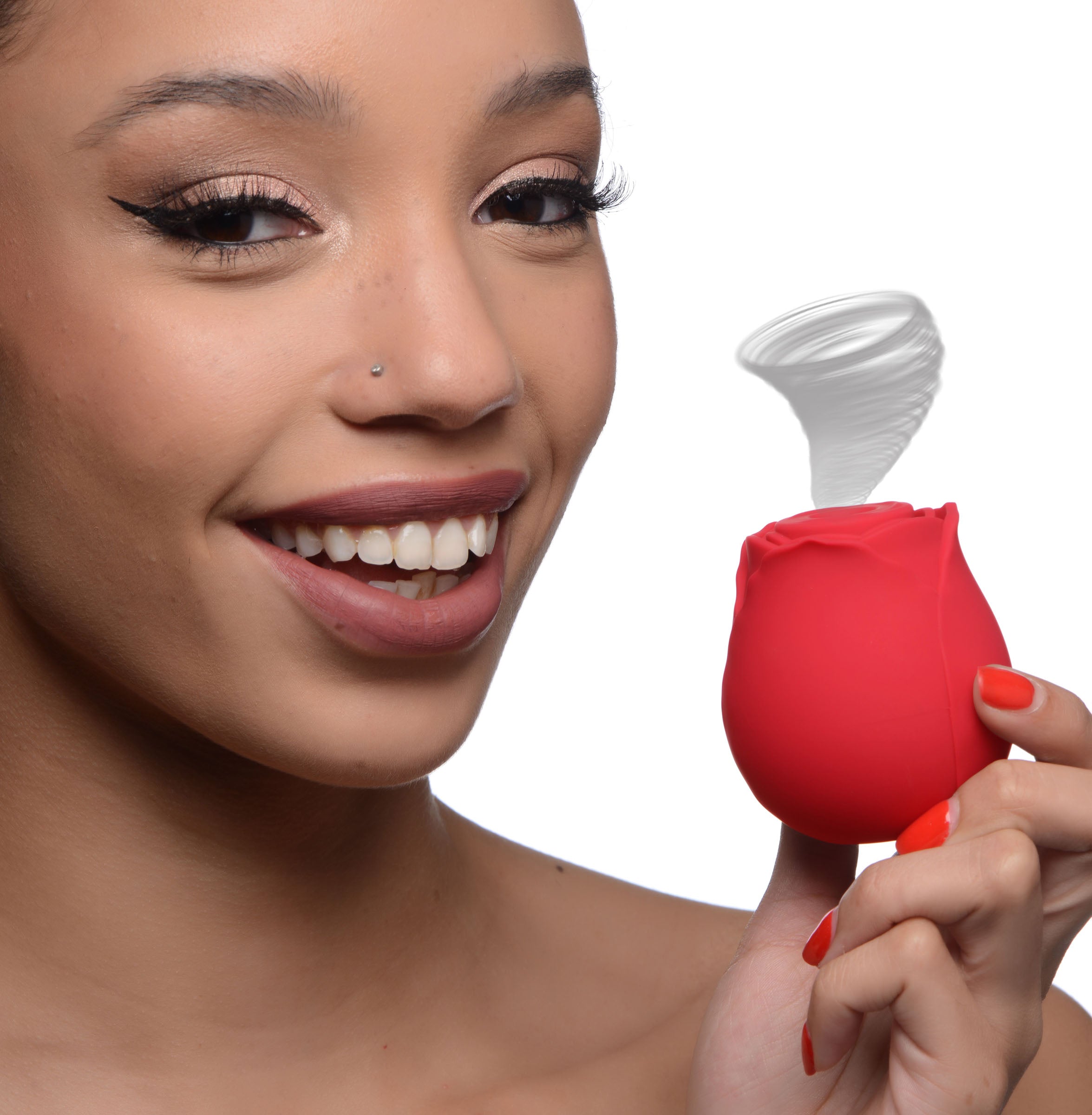 Person holding a rose-shaped red adult suction device