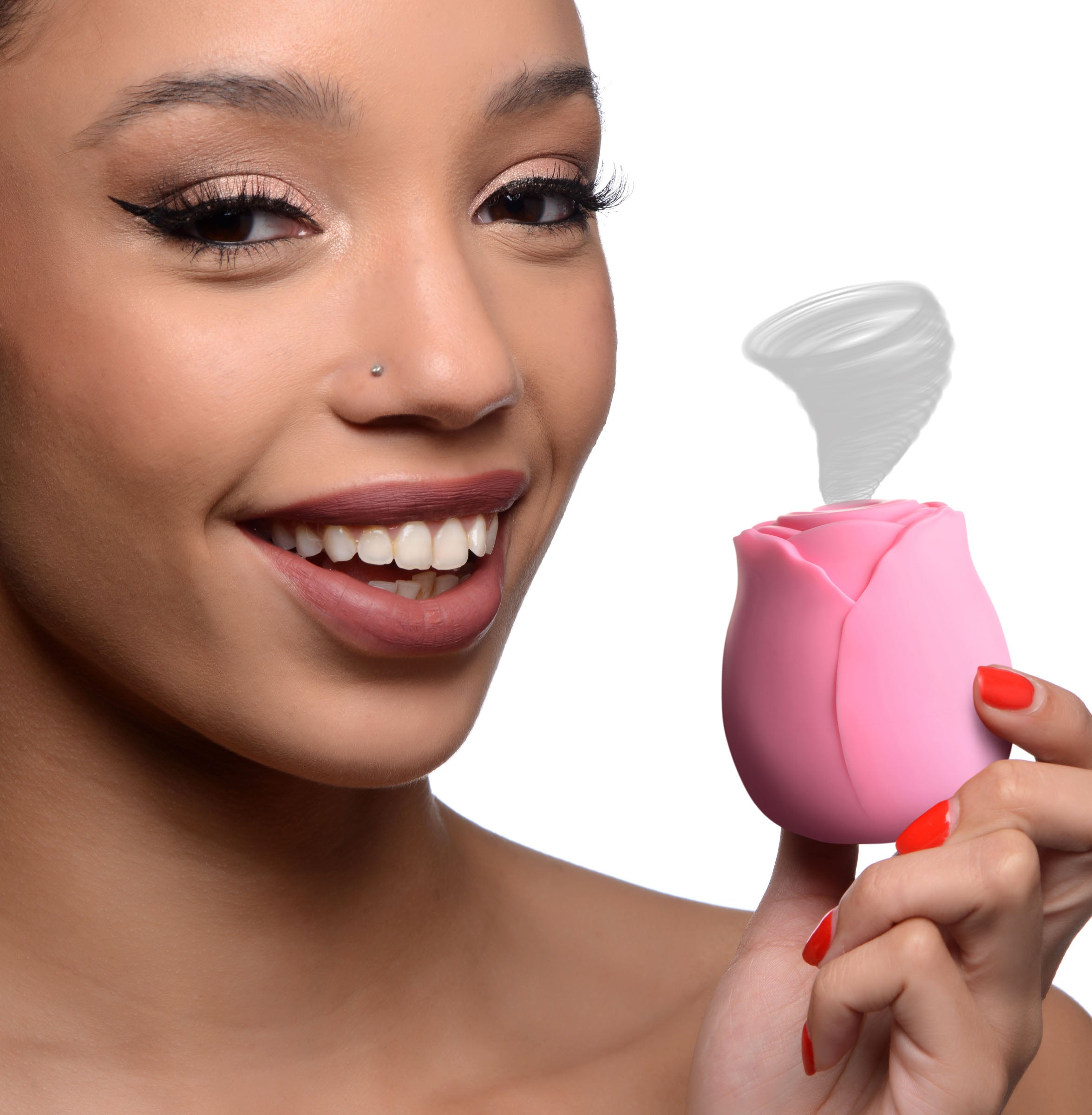 Woman demonstrating the use of a flower-shaped intimate toy