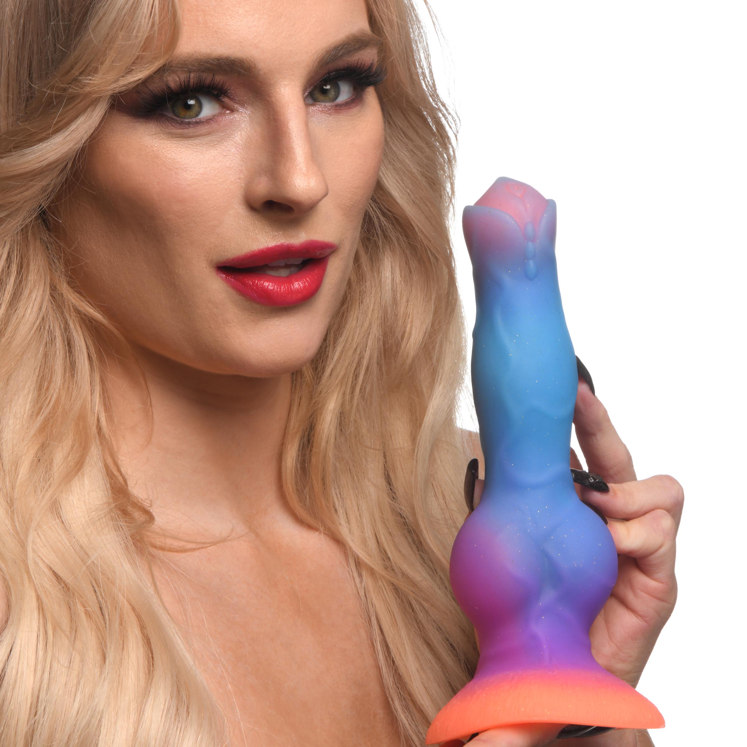 Person presenting the Space Cock alien dildo