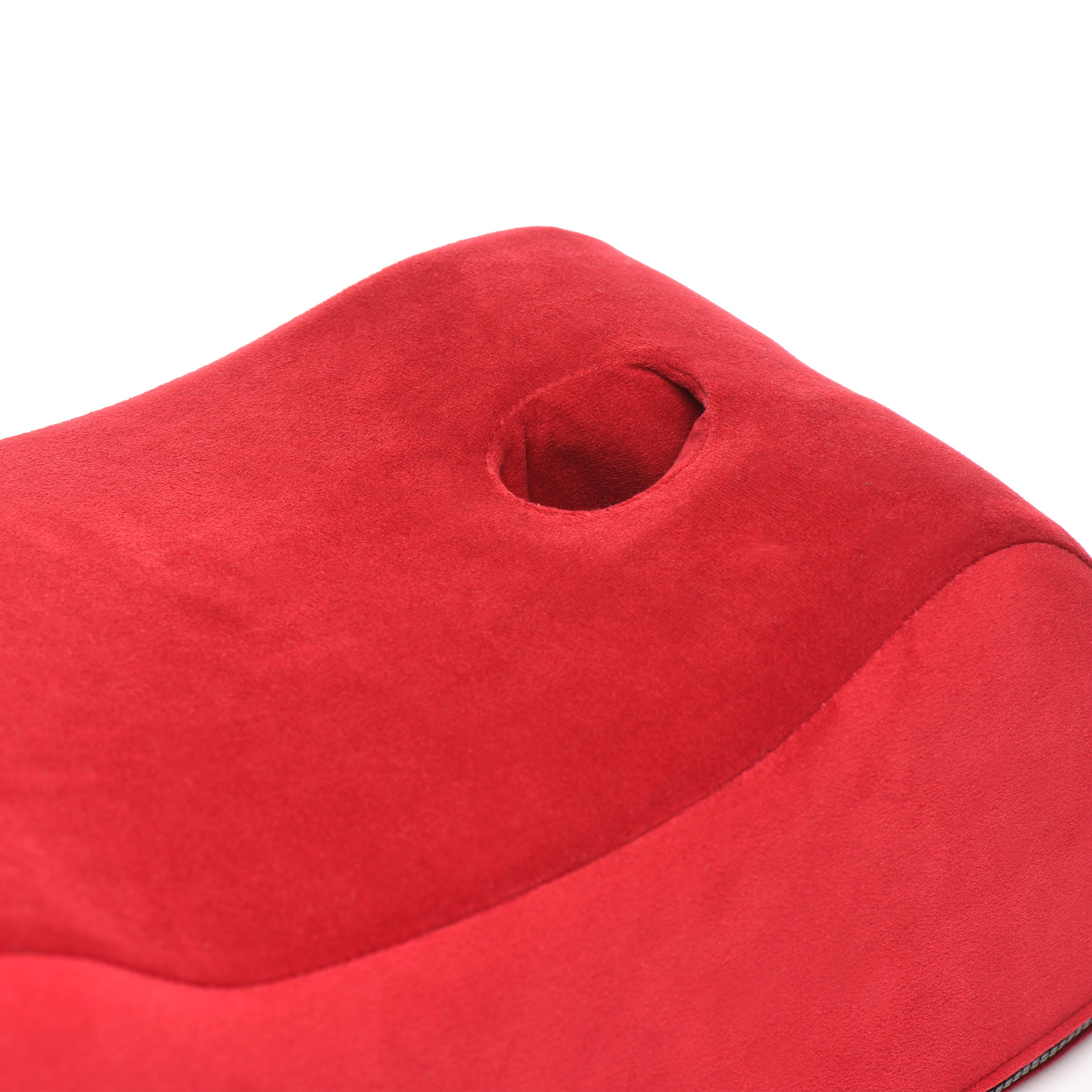 Red cushion designed with a central aperture for the wand