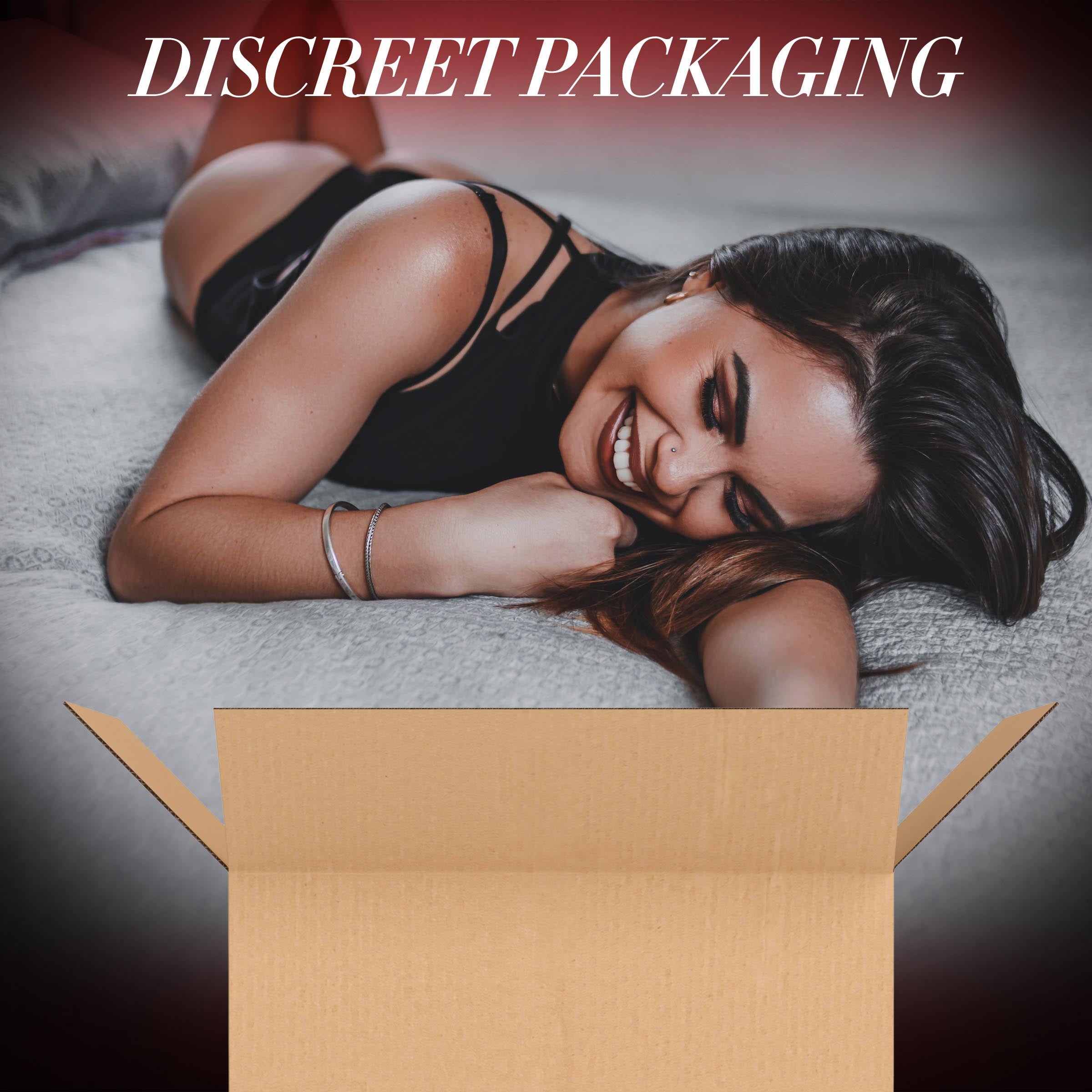 Mystery box for women with discreet packaging on a bed