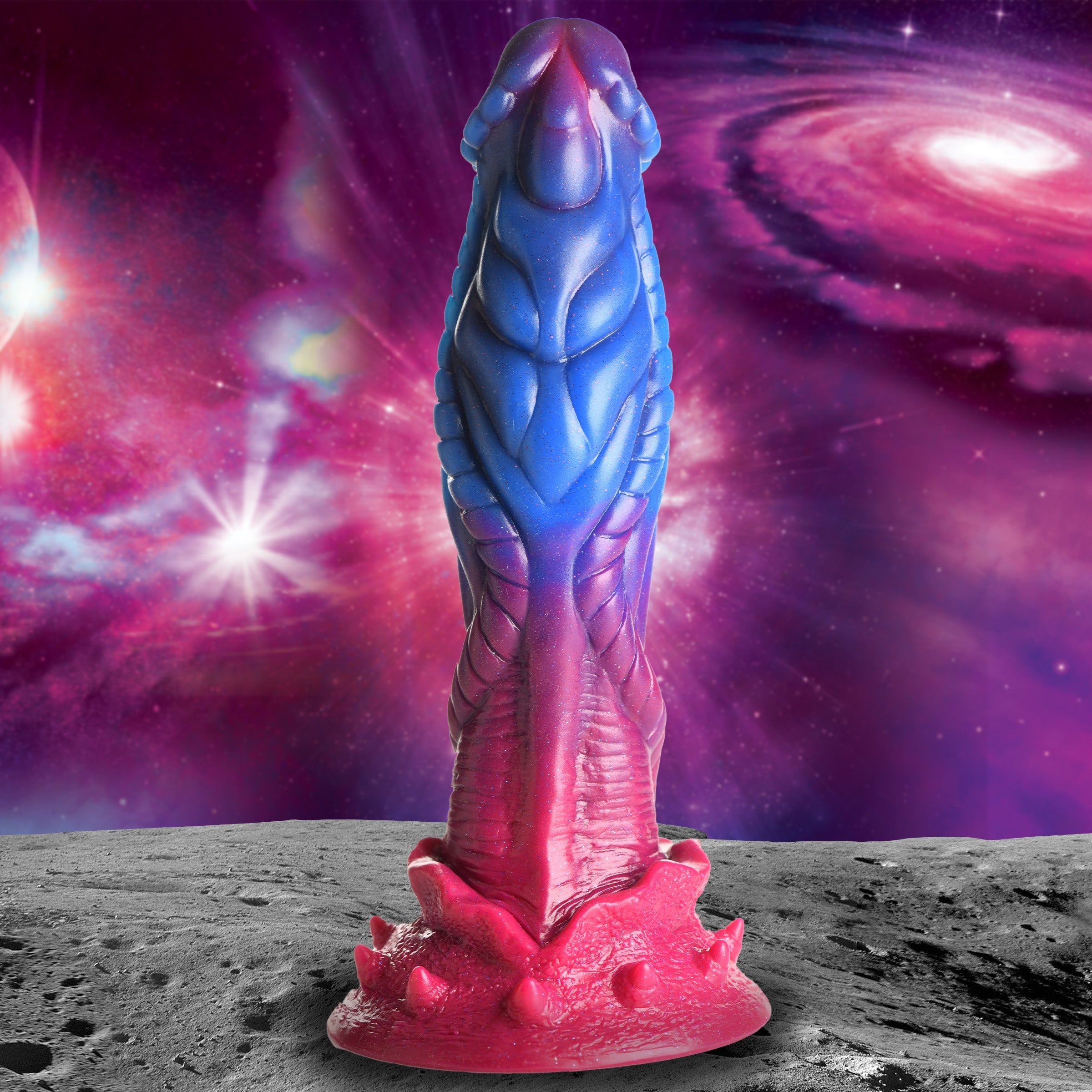 Purple and blue silicone dildo with a space-themed backdrop