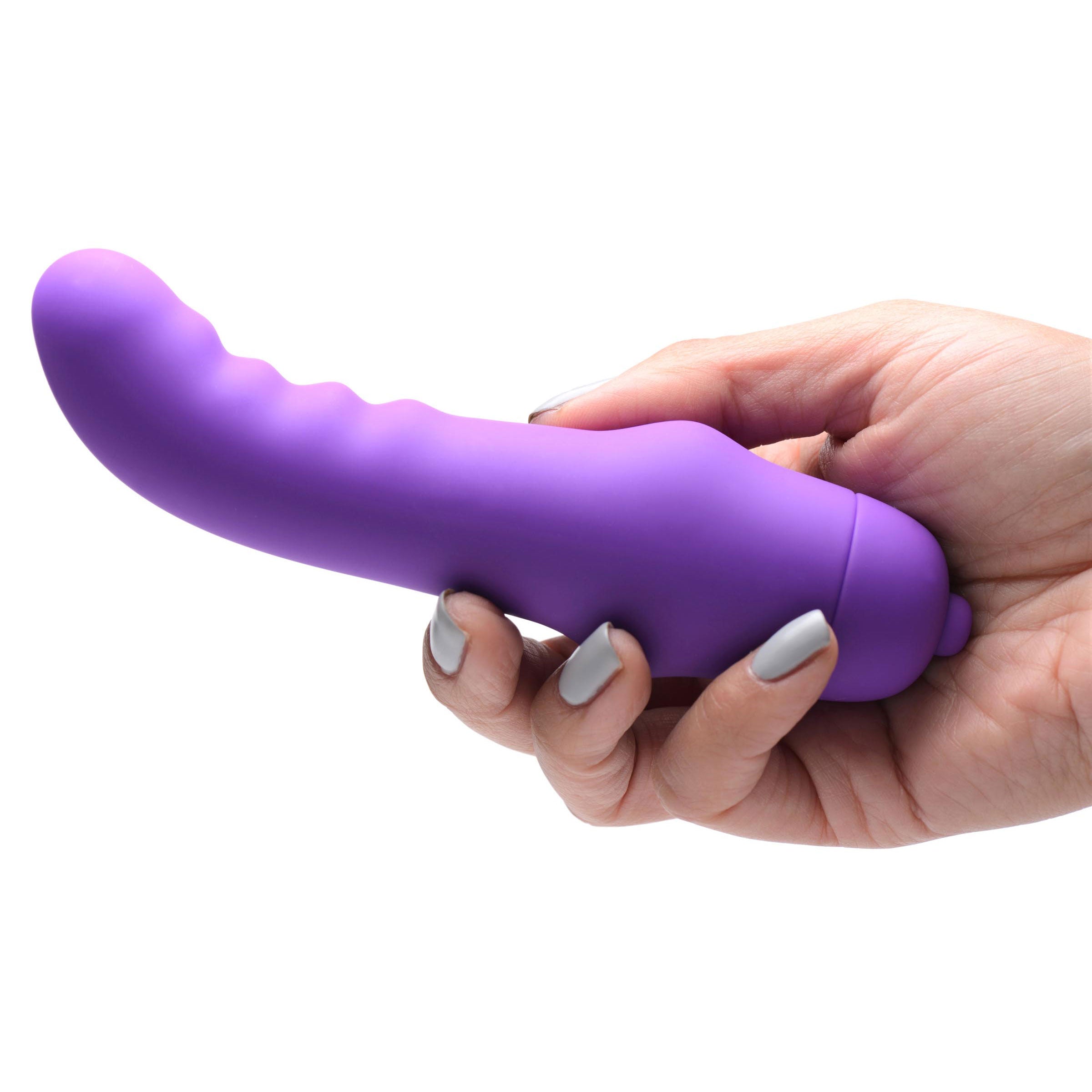 Person holding the 7x Mini Silicone G-spot Vibrator in their hand