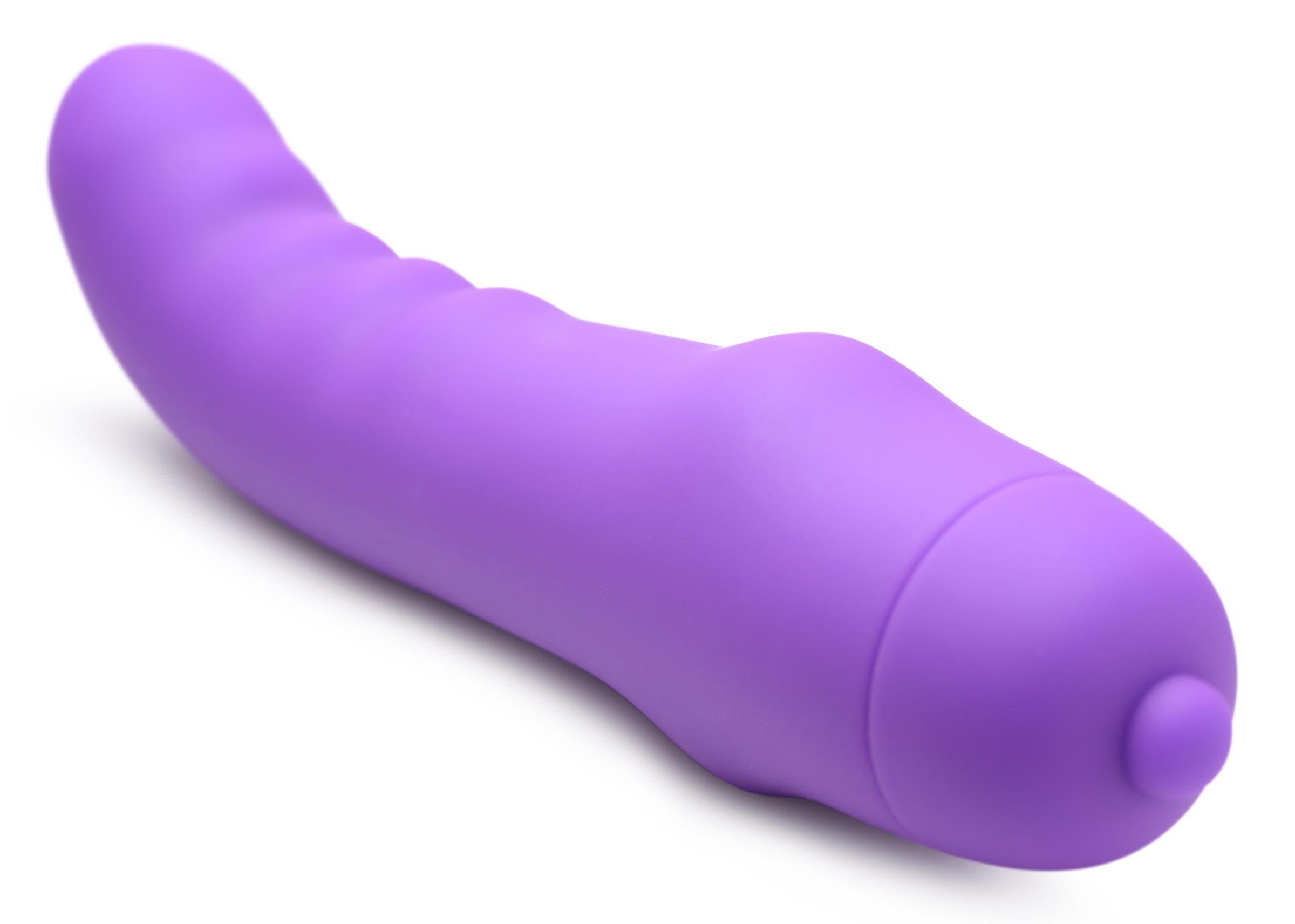 Miniature purple G-spot vibrator displayed against a white backdrop