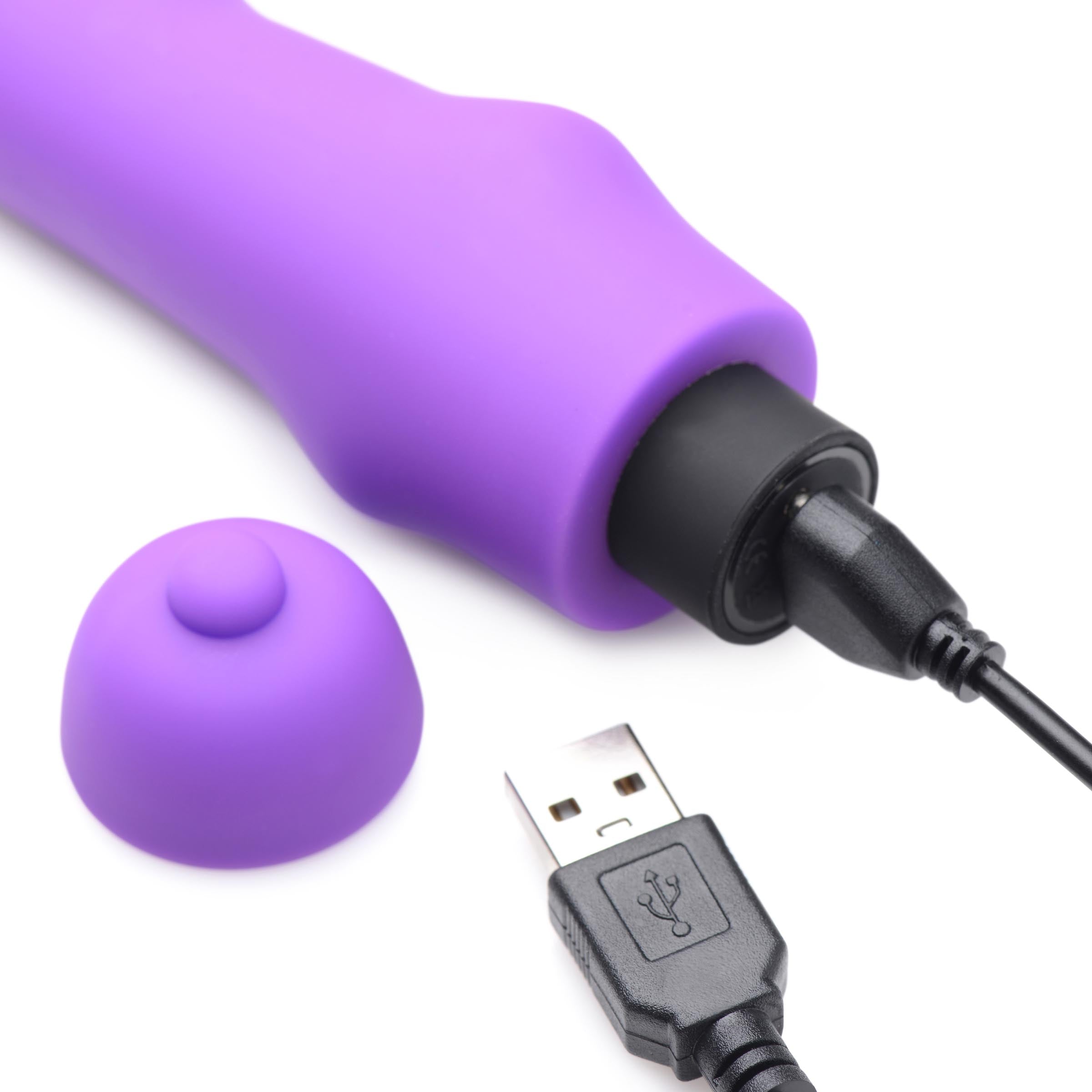 Purple G-spot vibrator with its USB charging cable