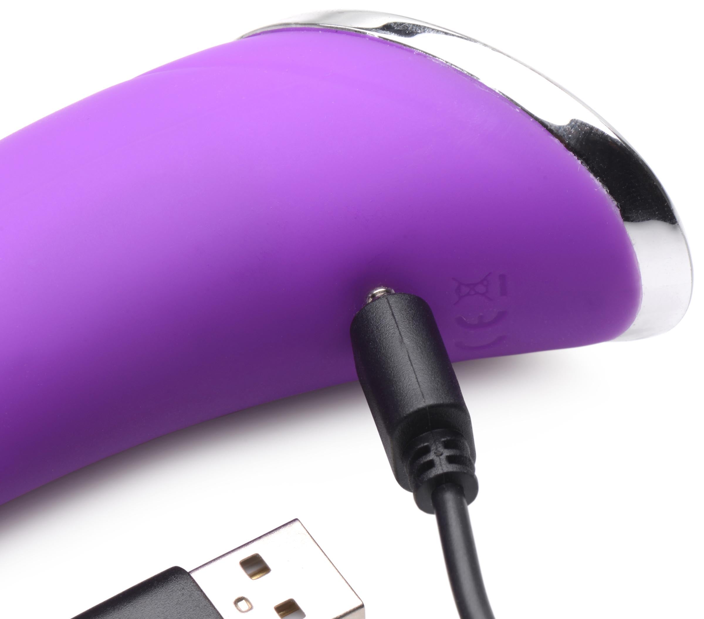 Purple Zippy Silicone Rabbit Vibrator charging with USB cable