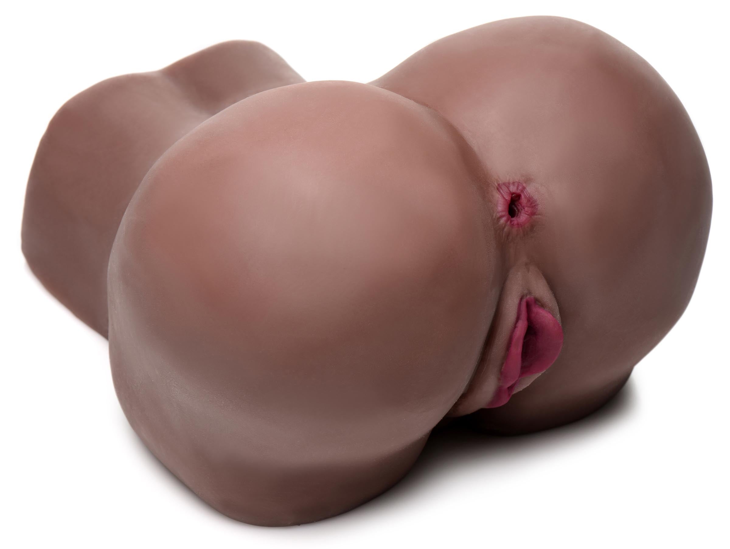 Adult toy designed to resemble a woman's lower body in a doggie style position