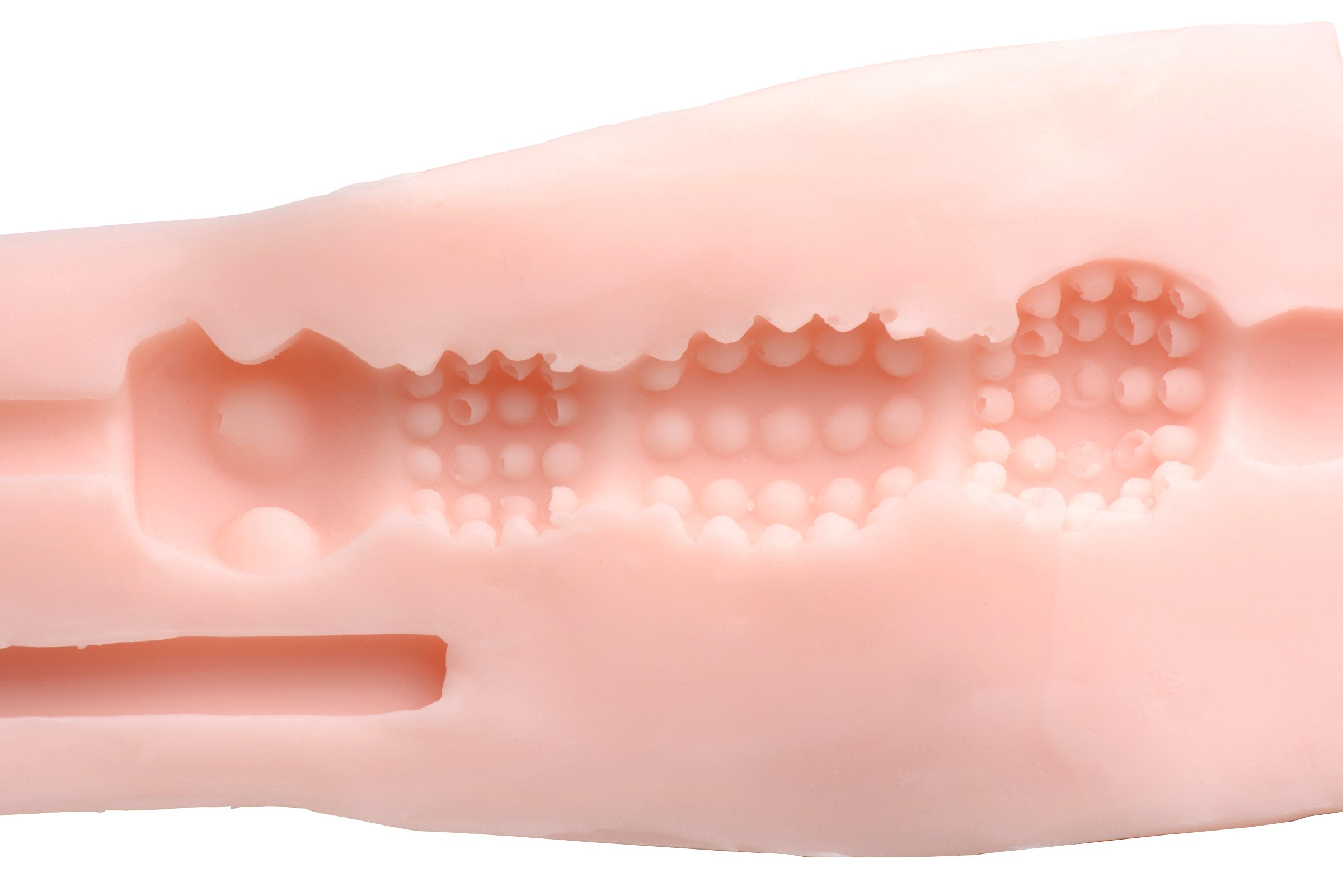 Detailed image of the light-colored textured interior of the mouth stroker