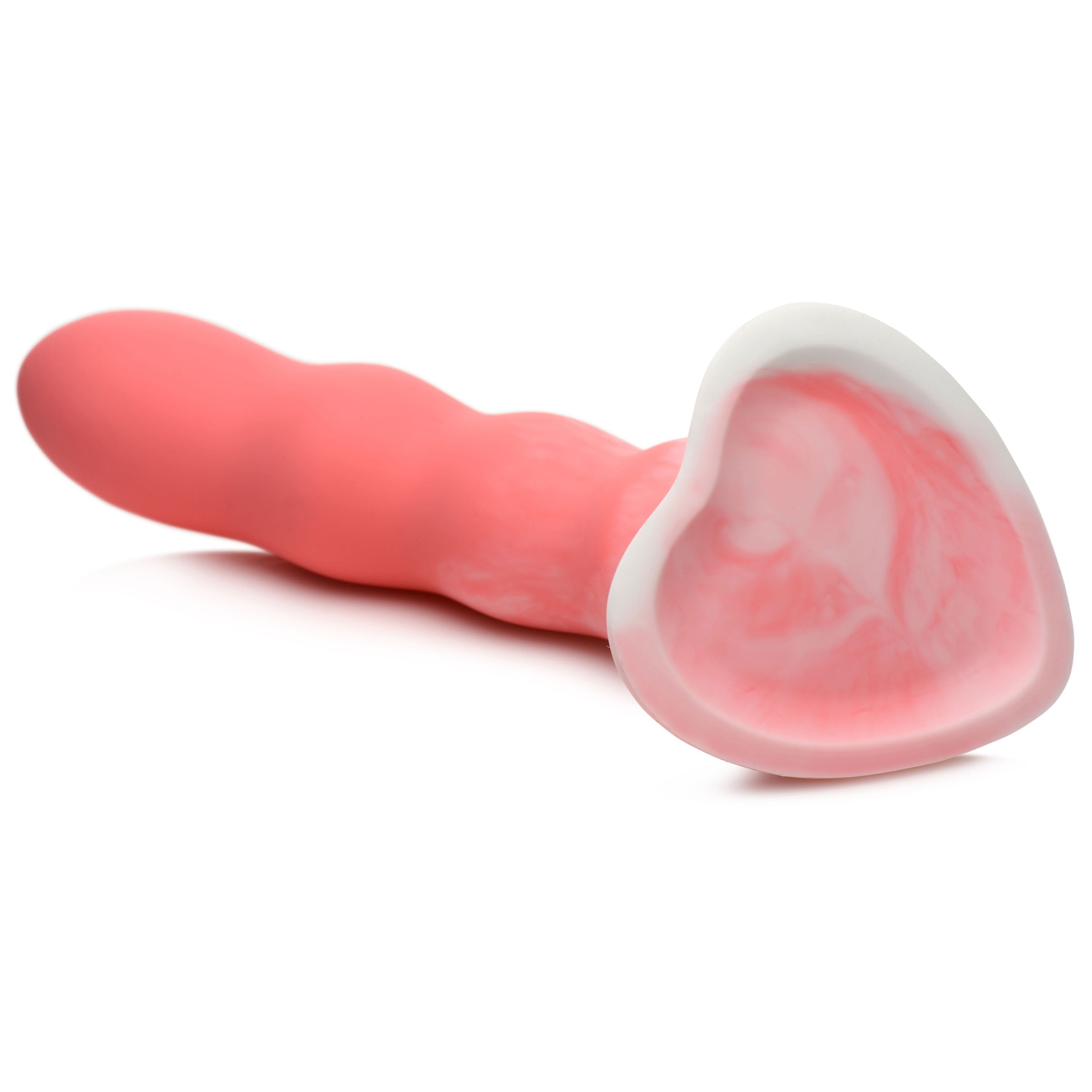 Pink heart-shaped dildo with a white handle on a white surface