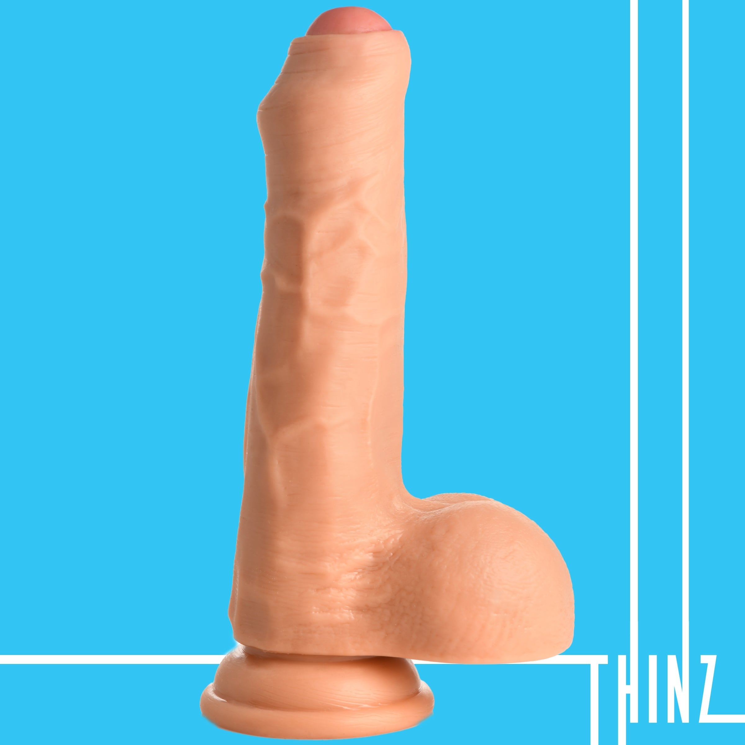 Silicone 7-inch dildo with realistic features on blue background