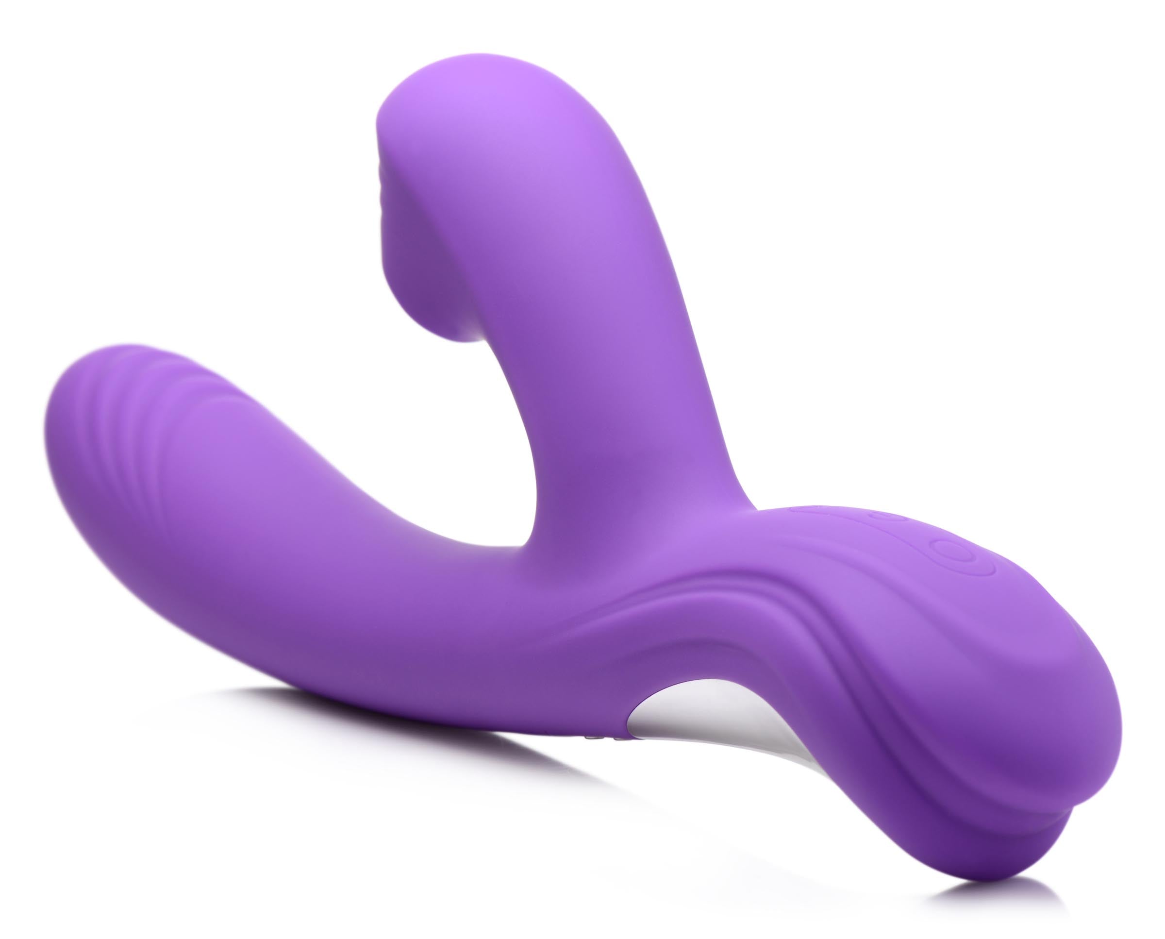 Angled view of the silicone suction rabbit vibrator on a pristine white surface