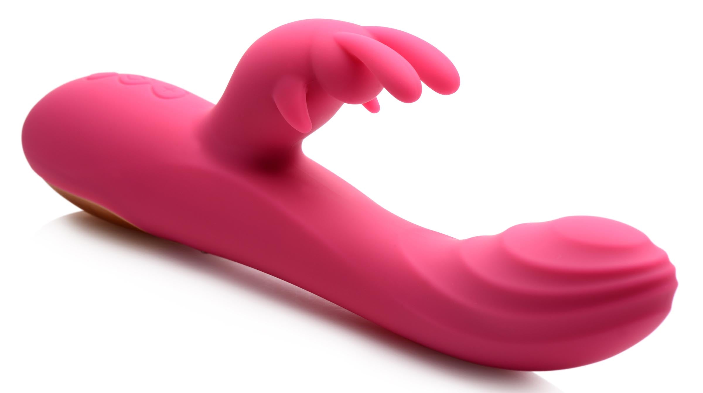 Hand gripping the Huggers 10x Rabbit Vibrator to demonstrate texture