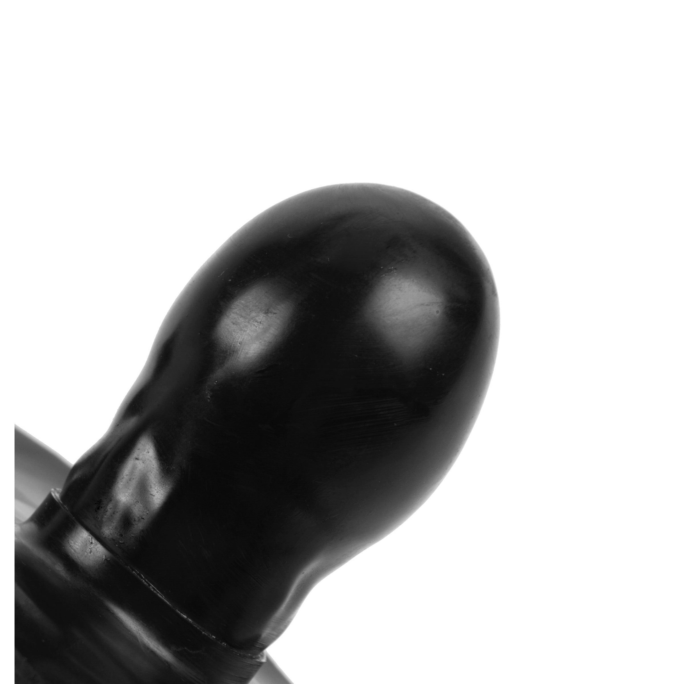 Novelty penis-shaped inflatable gag with a white backdrop