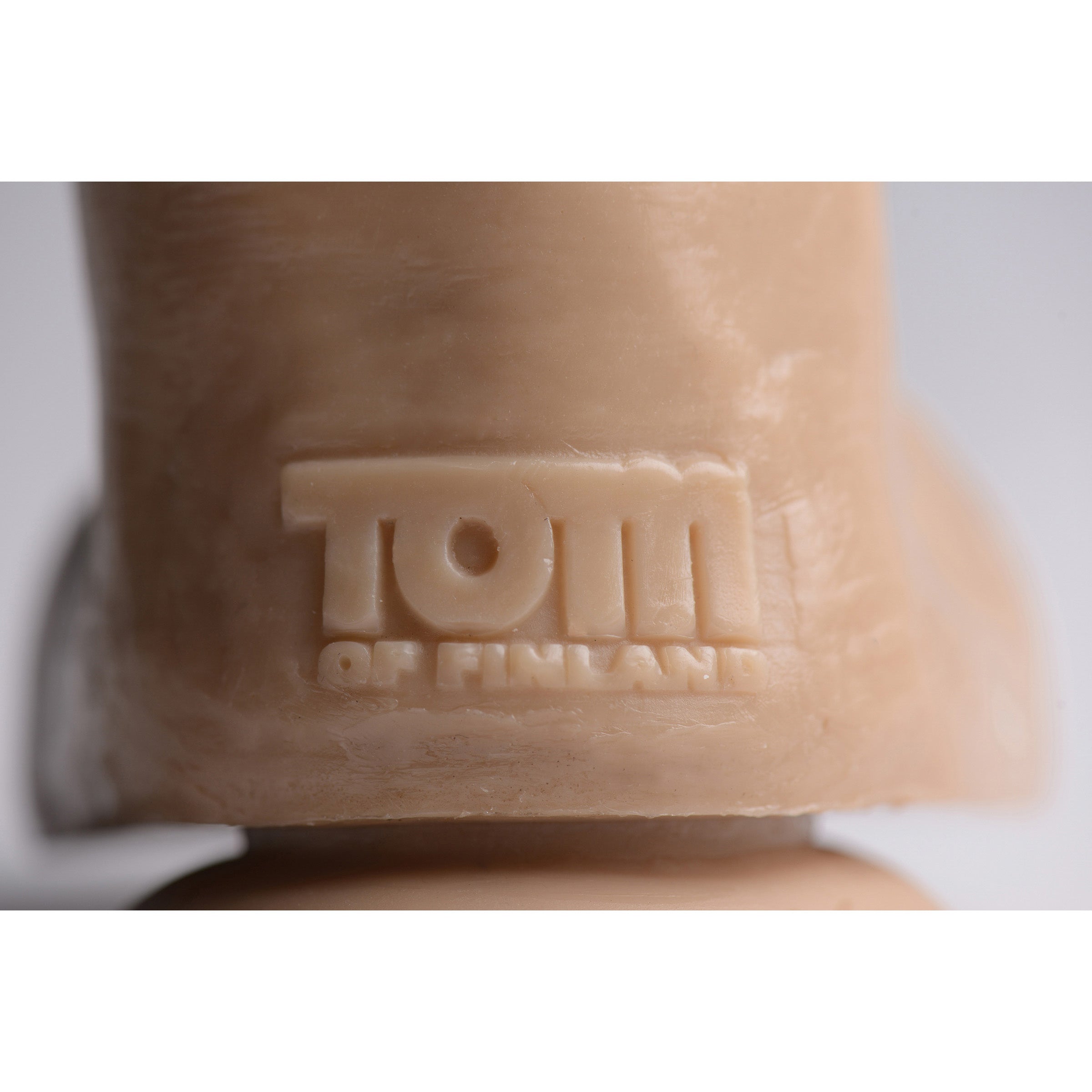 Tom of Finland branding on the Ready Steady Realistic Dildo product