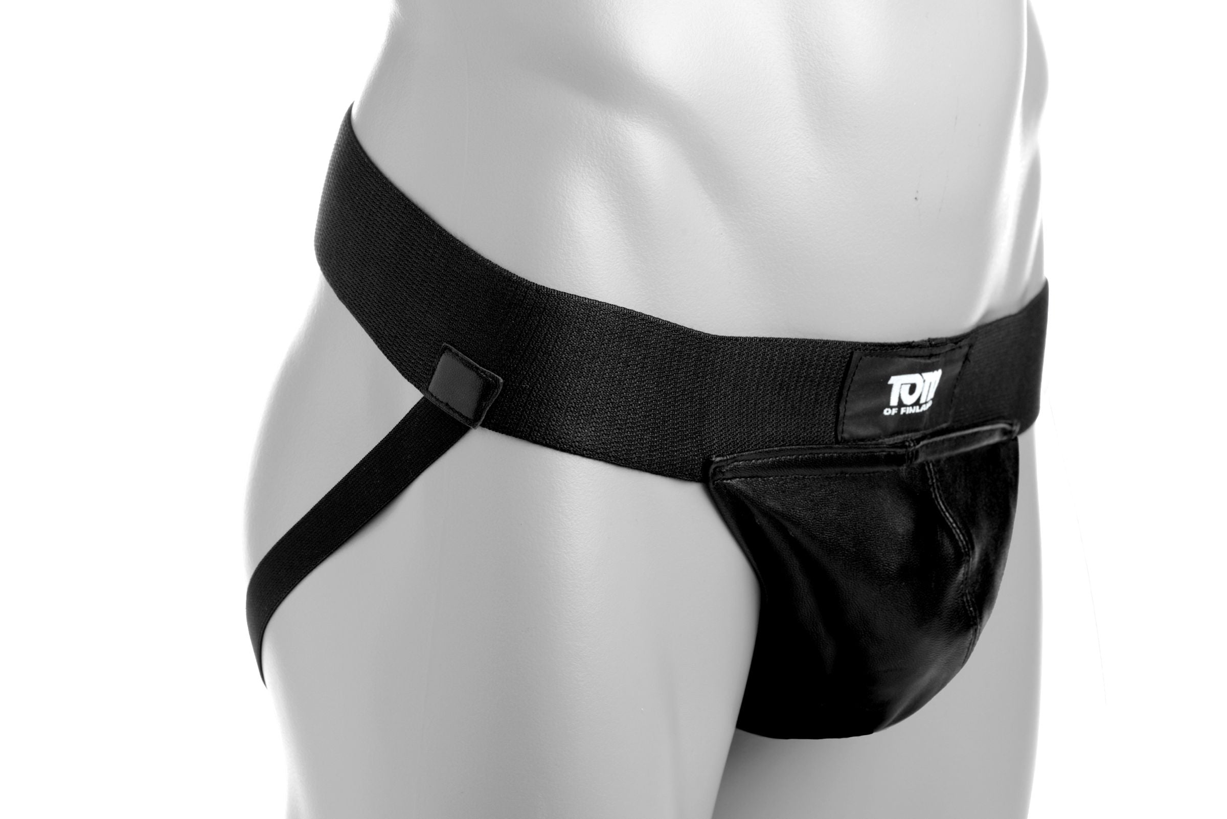 Close-up of Tom of Finland leather jock strap's black nylon waistband