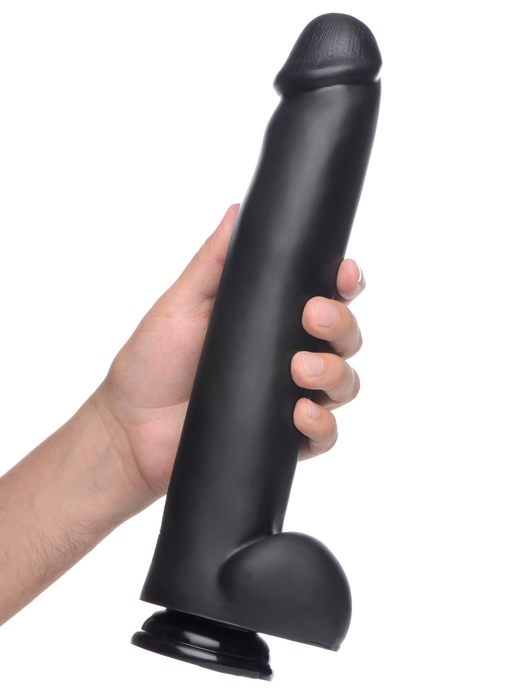 Person demonstrating how to hold the black suction cup dildo