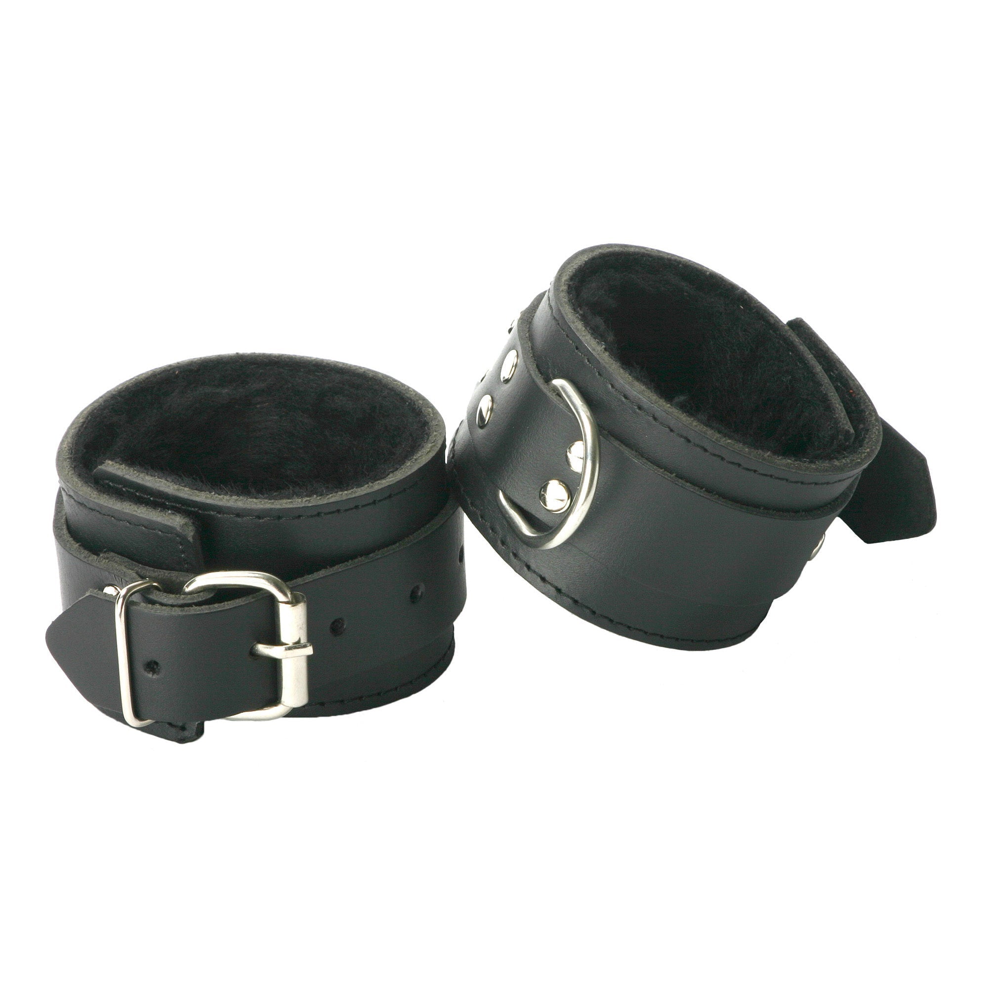 Pair of black leather ankle cuffs with fur lining and metal buckles